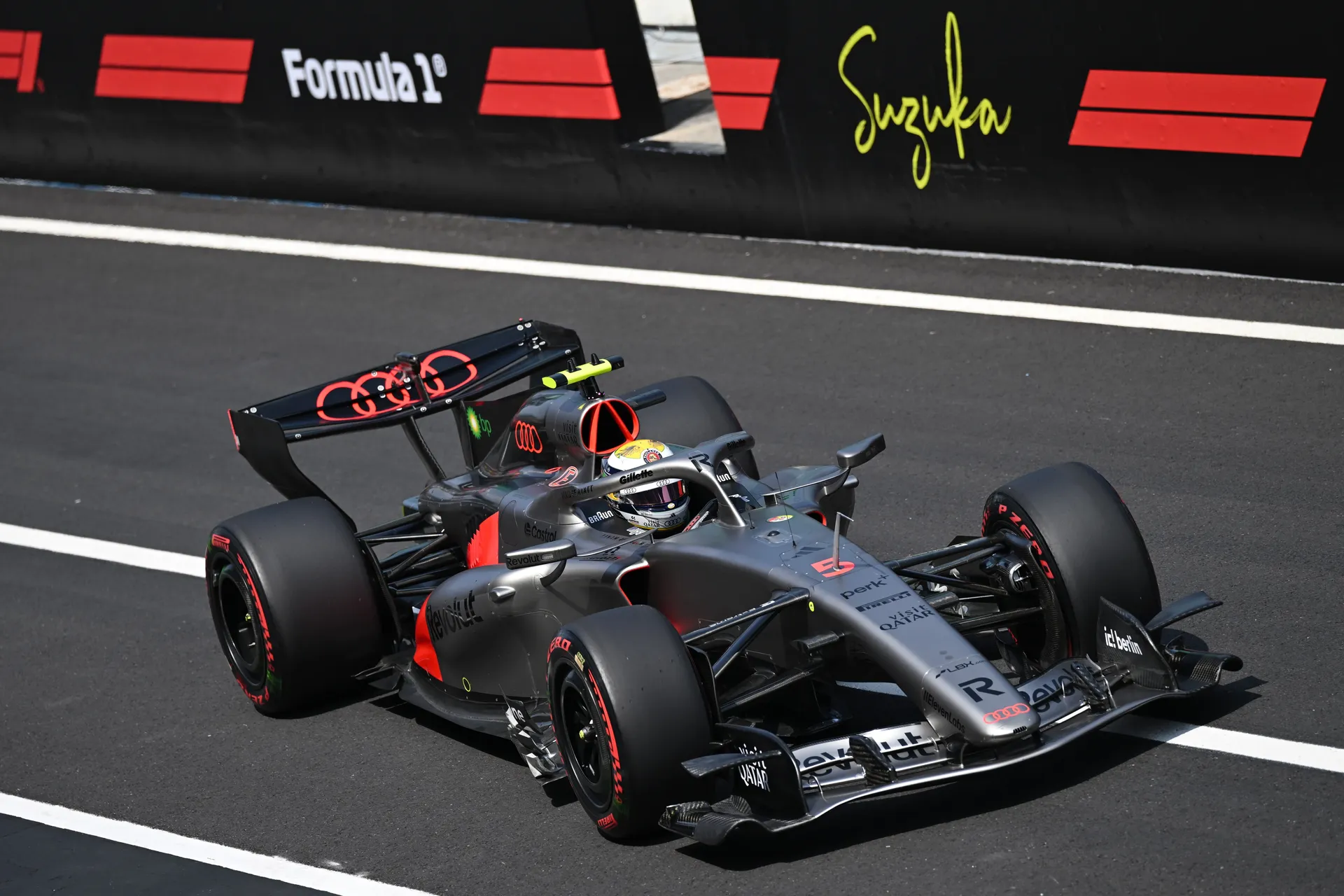 Gabriel Bortoleto drives the Audi Revolut F1® Team car down the pit lane at Suzuka during Formula 1 running.