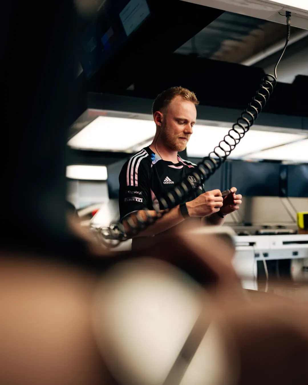 The team prepares in the garage
