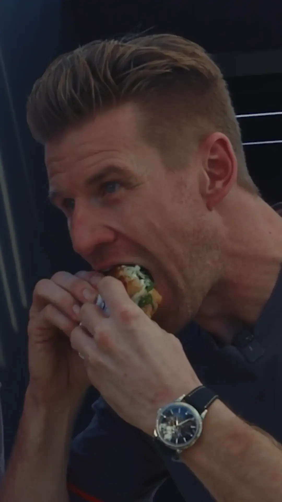 Niko Hulkenberg and Gabriel Bortoleto trying Nicos Deli Sandwiches