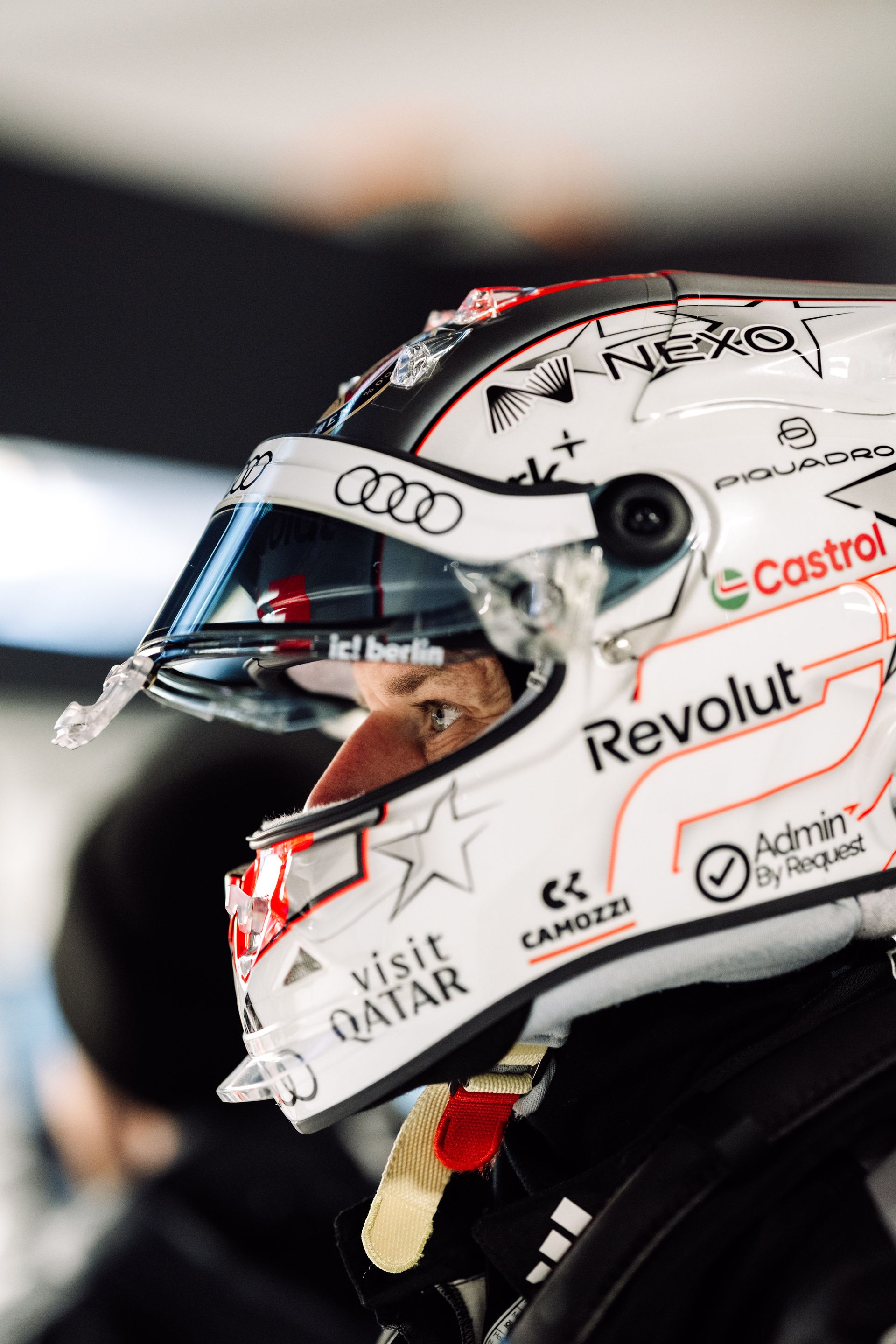 Side view Nico Hulkenberg wearing a helmet