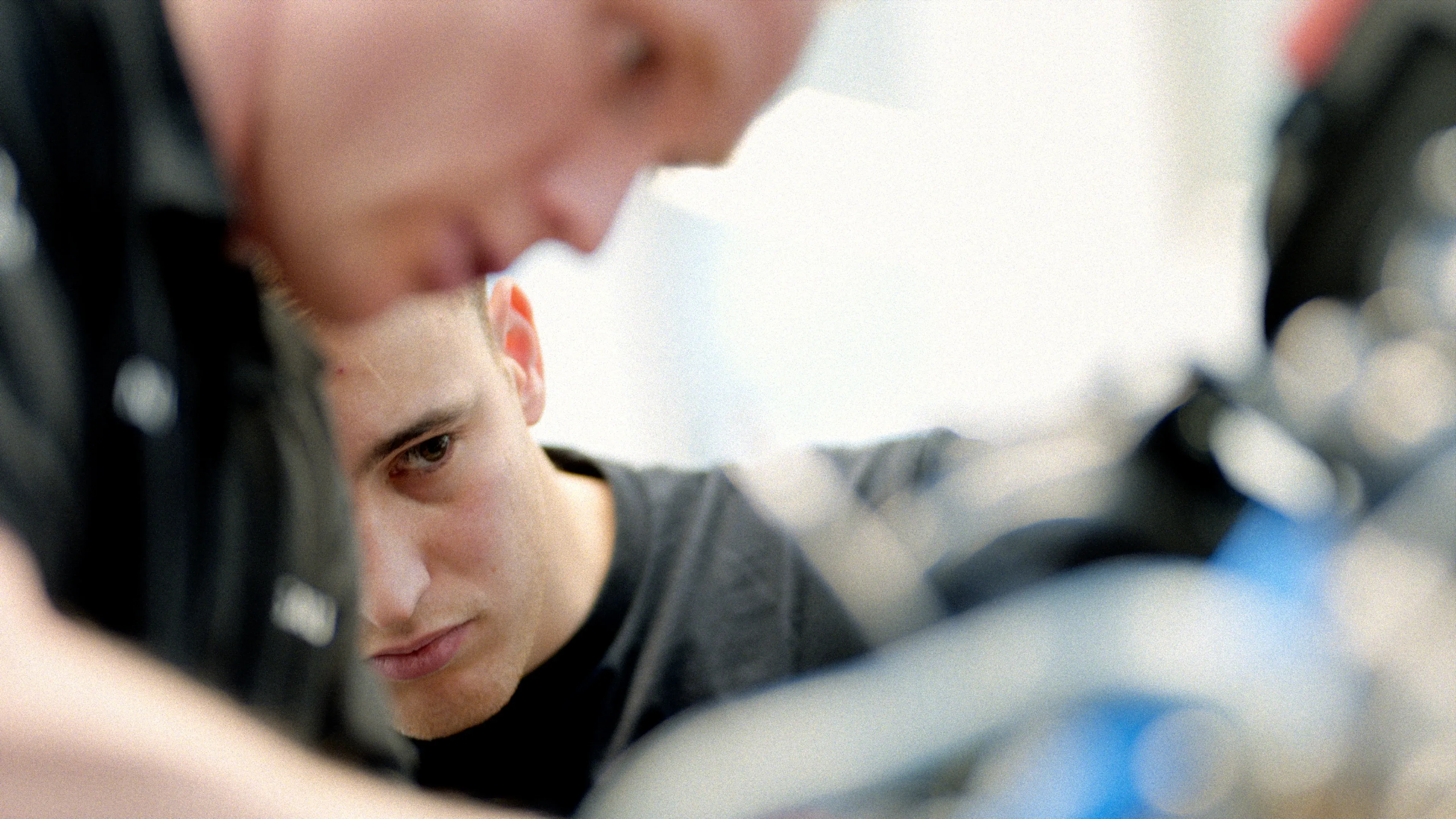 Two academy engineers watching on a subject