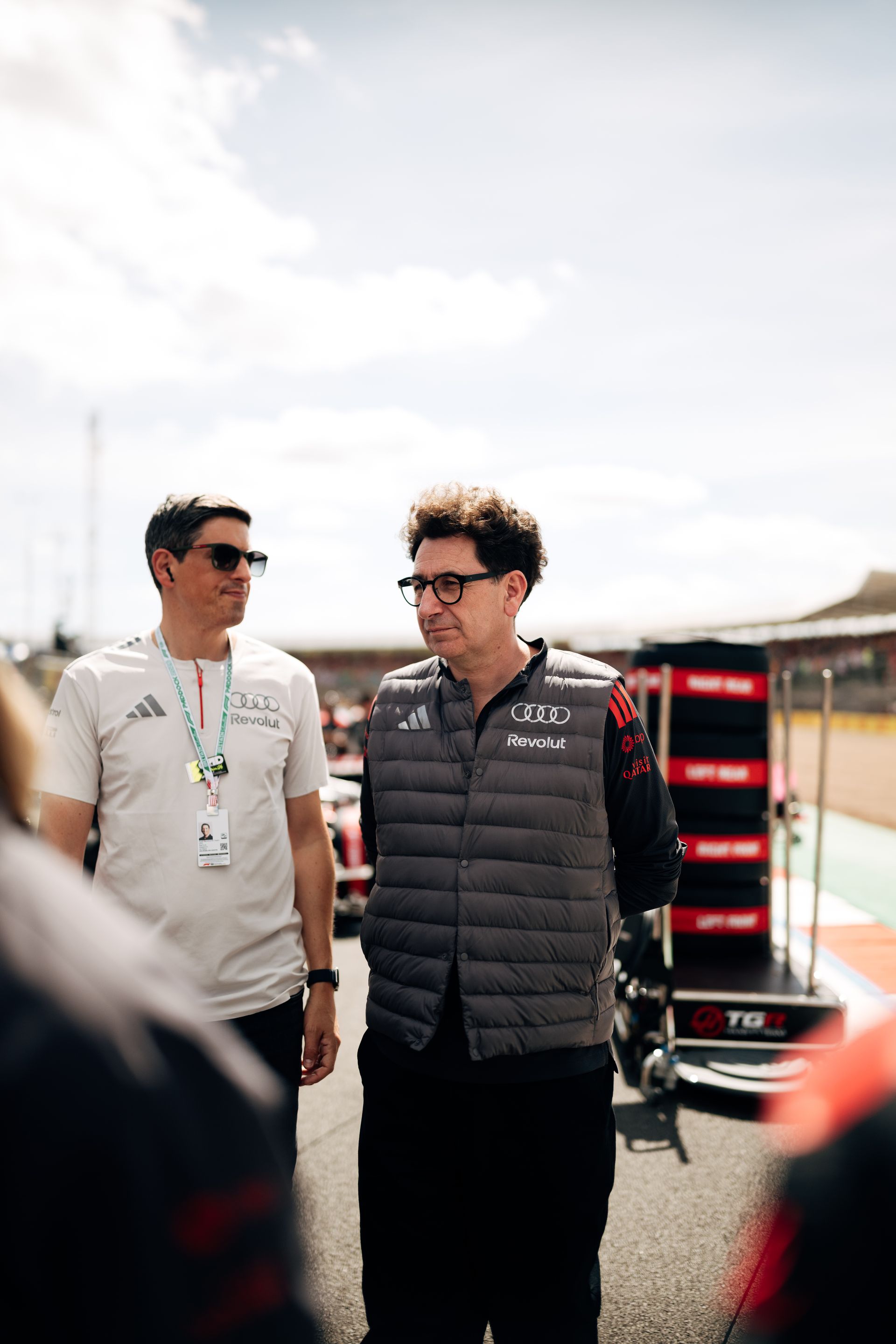 Mattia Binotto stand on the Silverstone grid, focused on final preparations before the race for Audi Revolut F1® Team.