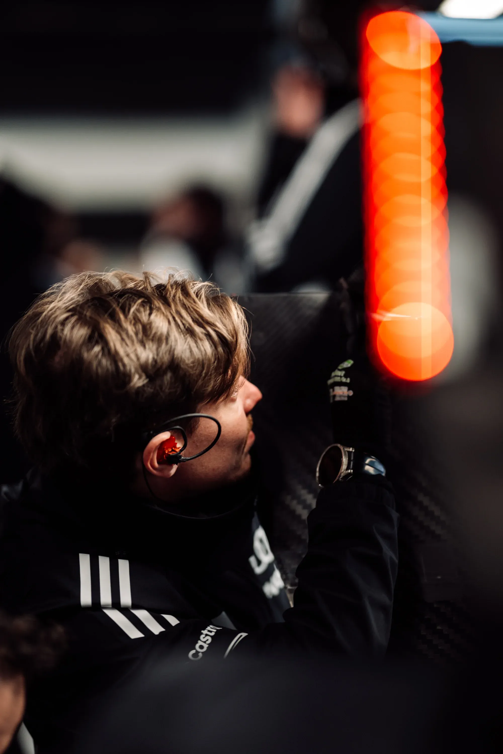 A mechanic working on the car