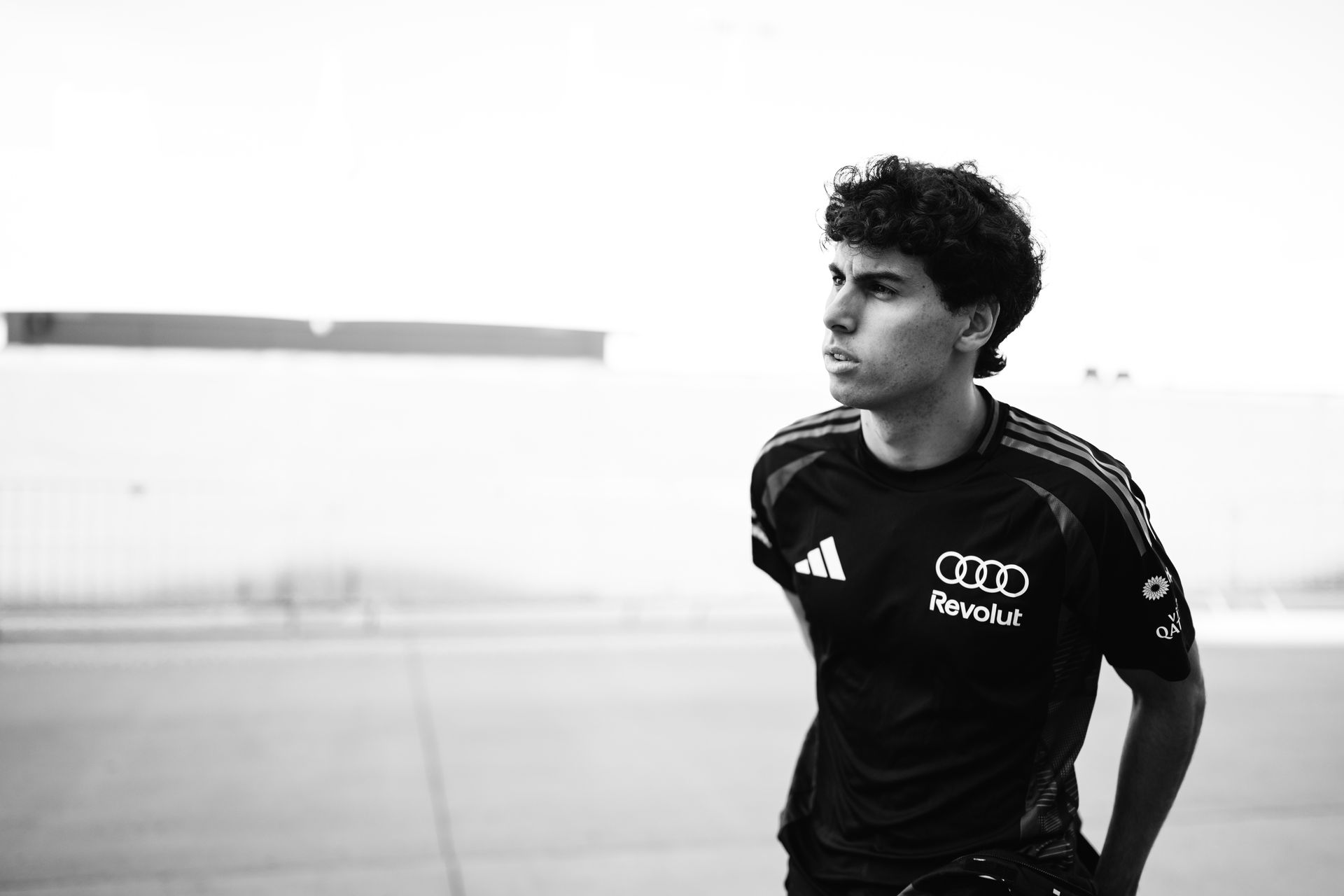  Black and white image of Gabriel Bortoleto walking around