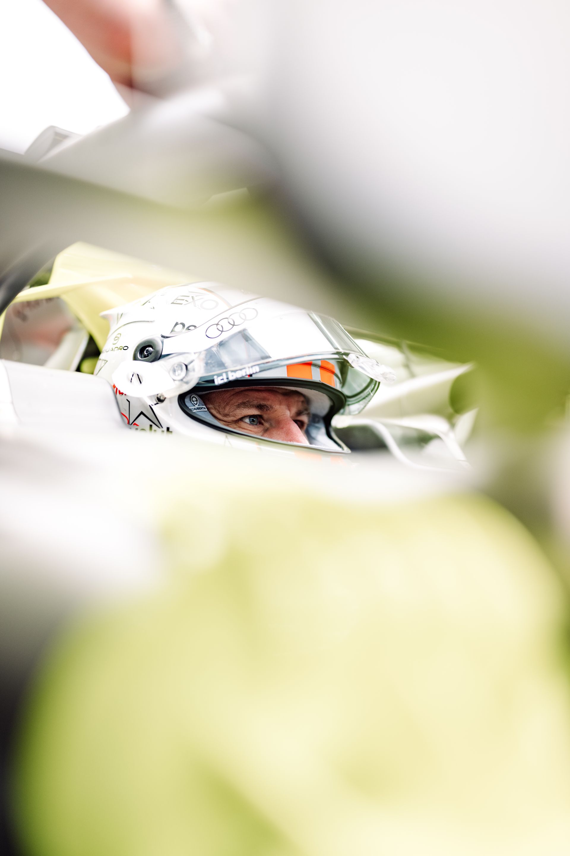 Close-up from Nico Hulkenberg in the car wearing a helmet