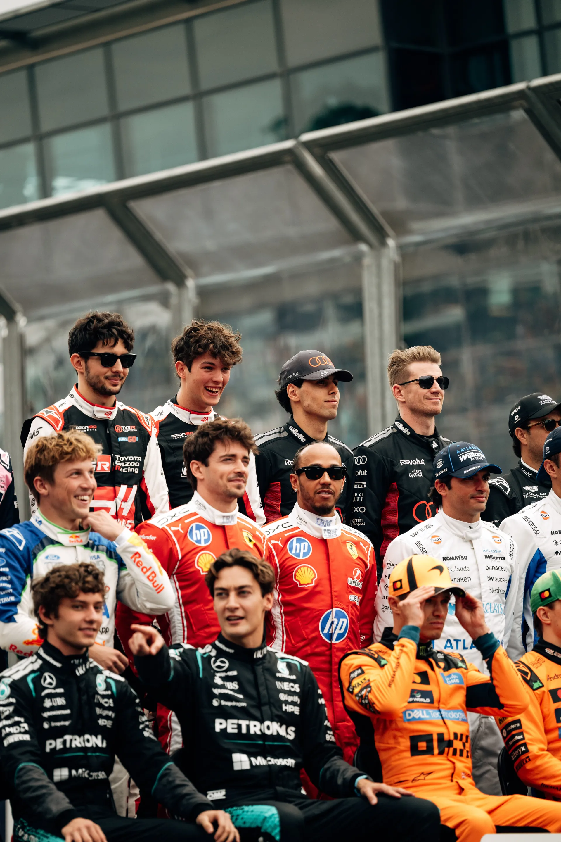 Audi Revolut F1® Team drivers Nico Hulkenberg and Gabriel Bortoleto appear in the front row of a group photo with Formula 1 drivers on the Melbourne grid.