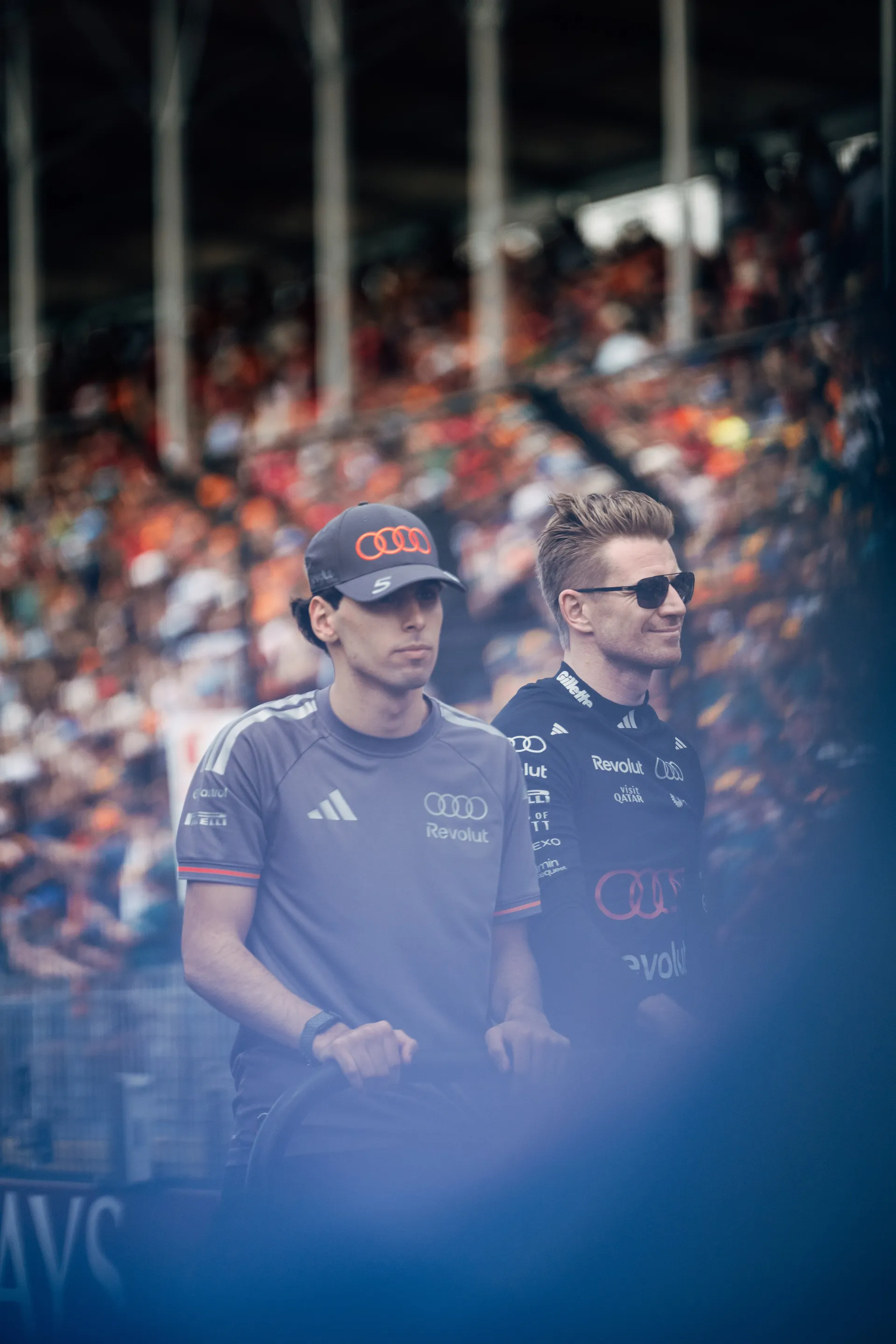 Audi Revolut F1® Team drivers  Nico Hulkenberg and Gabriel Bortoleto at the parade vehicle during the Melbourne drivers parade.