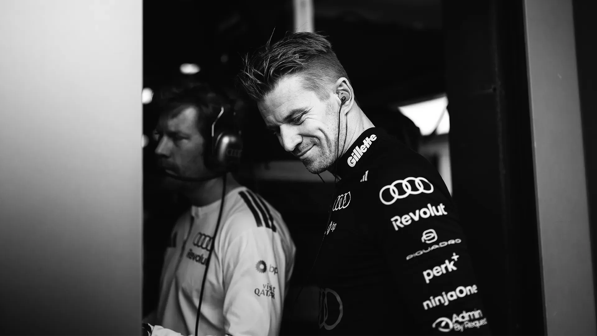 Nico is smiling in the pit before FP1