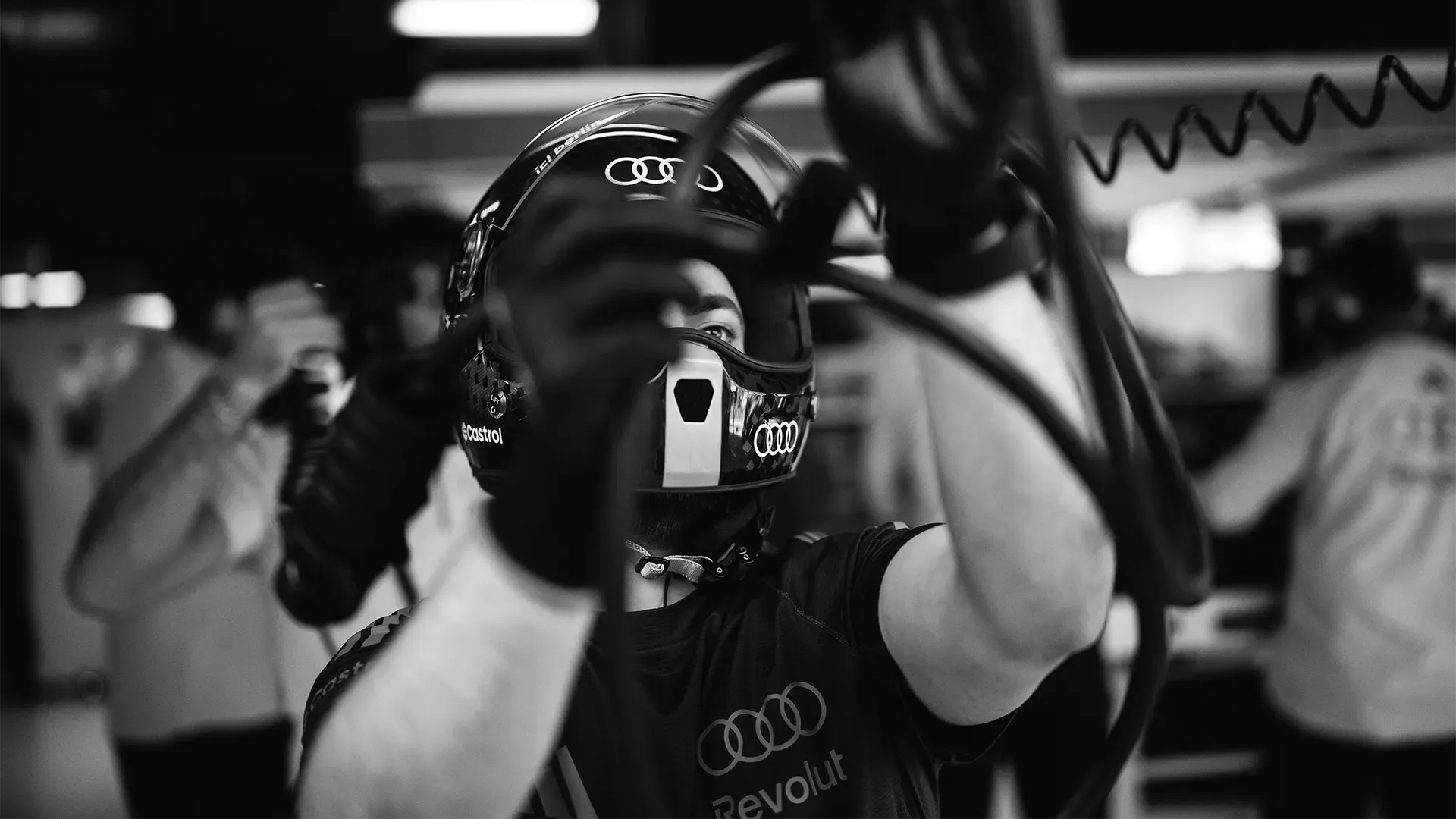 A Mechanic is working in the pit