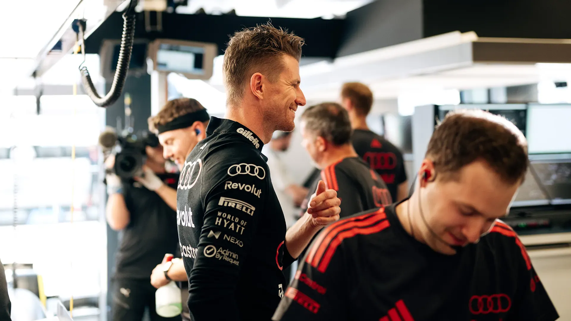 Nico smiling in the pit