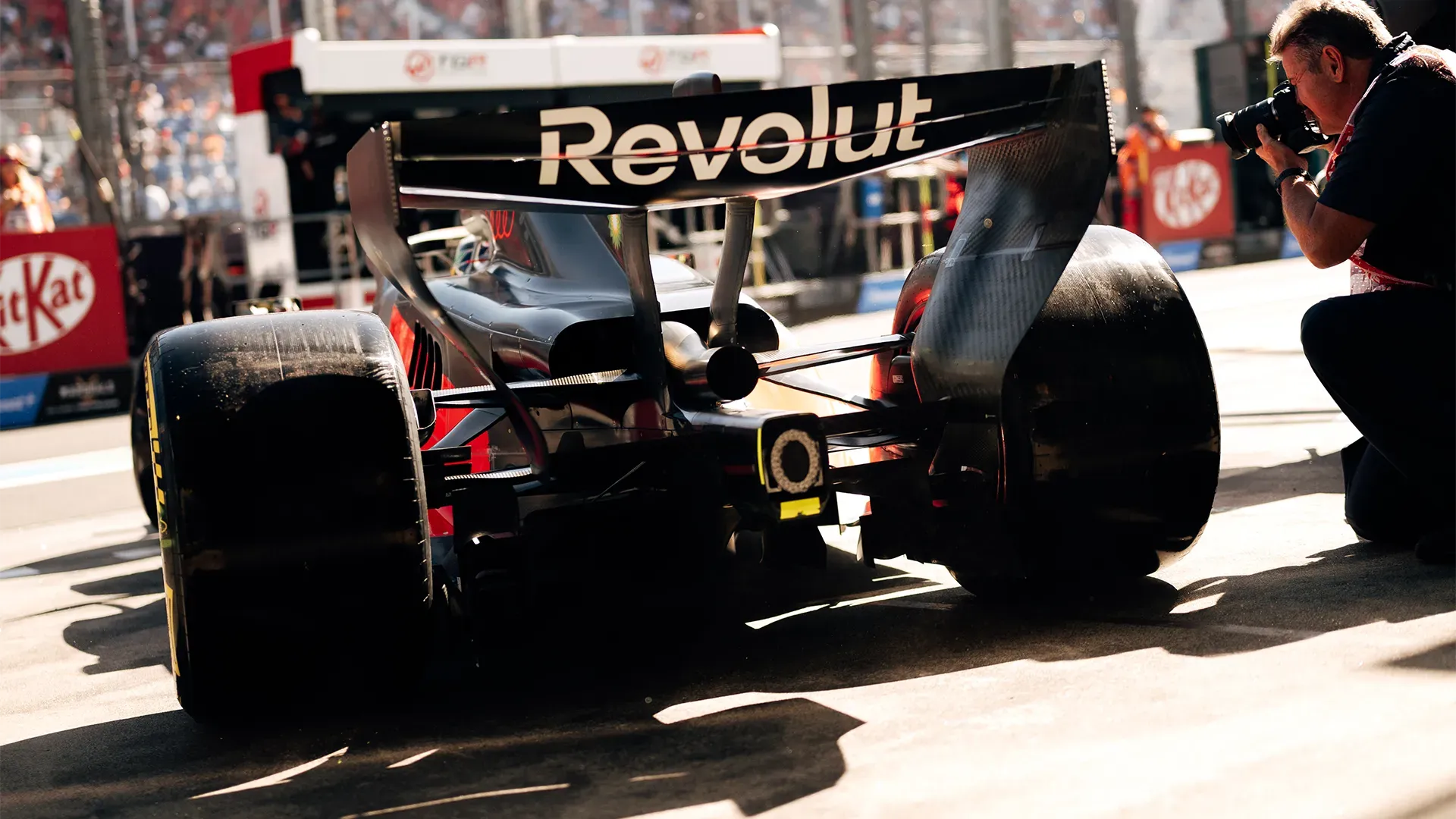 The car from behind leaving the pit