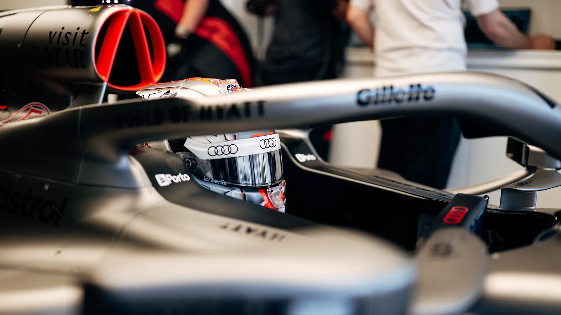 Nico sitting with helmet in the car
