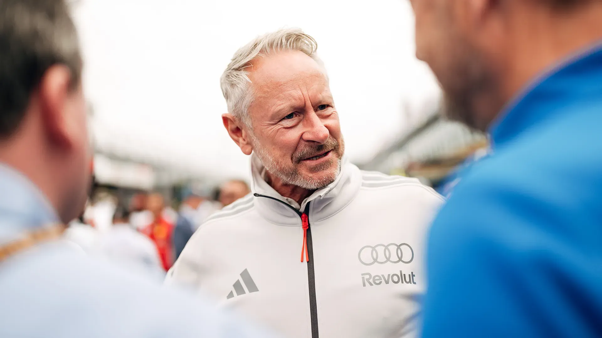 Jonathan Wheatley talking to others