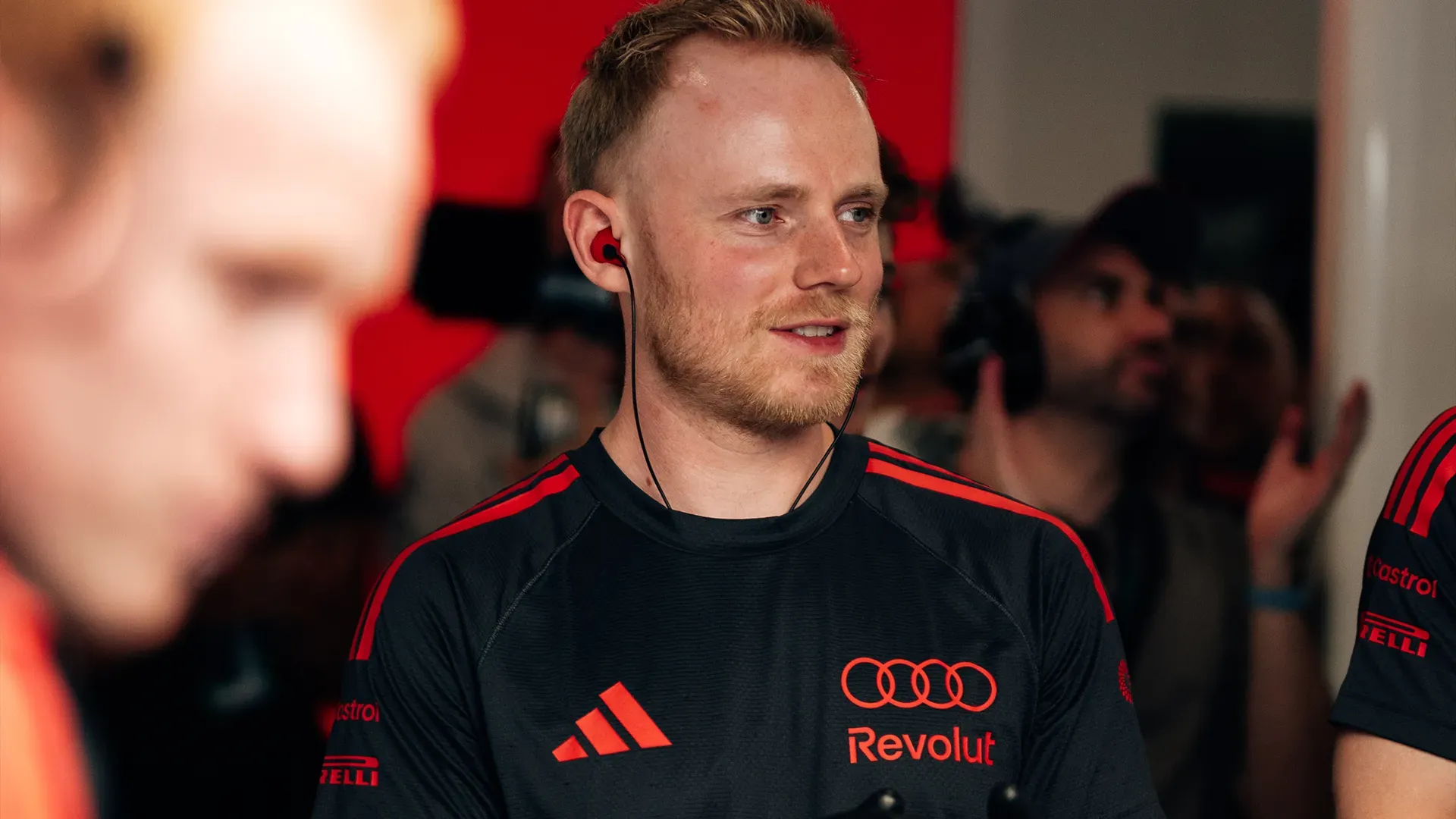 A team member smiling during the qualifying session