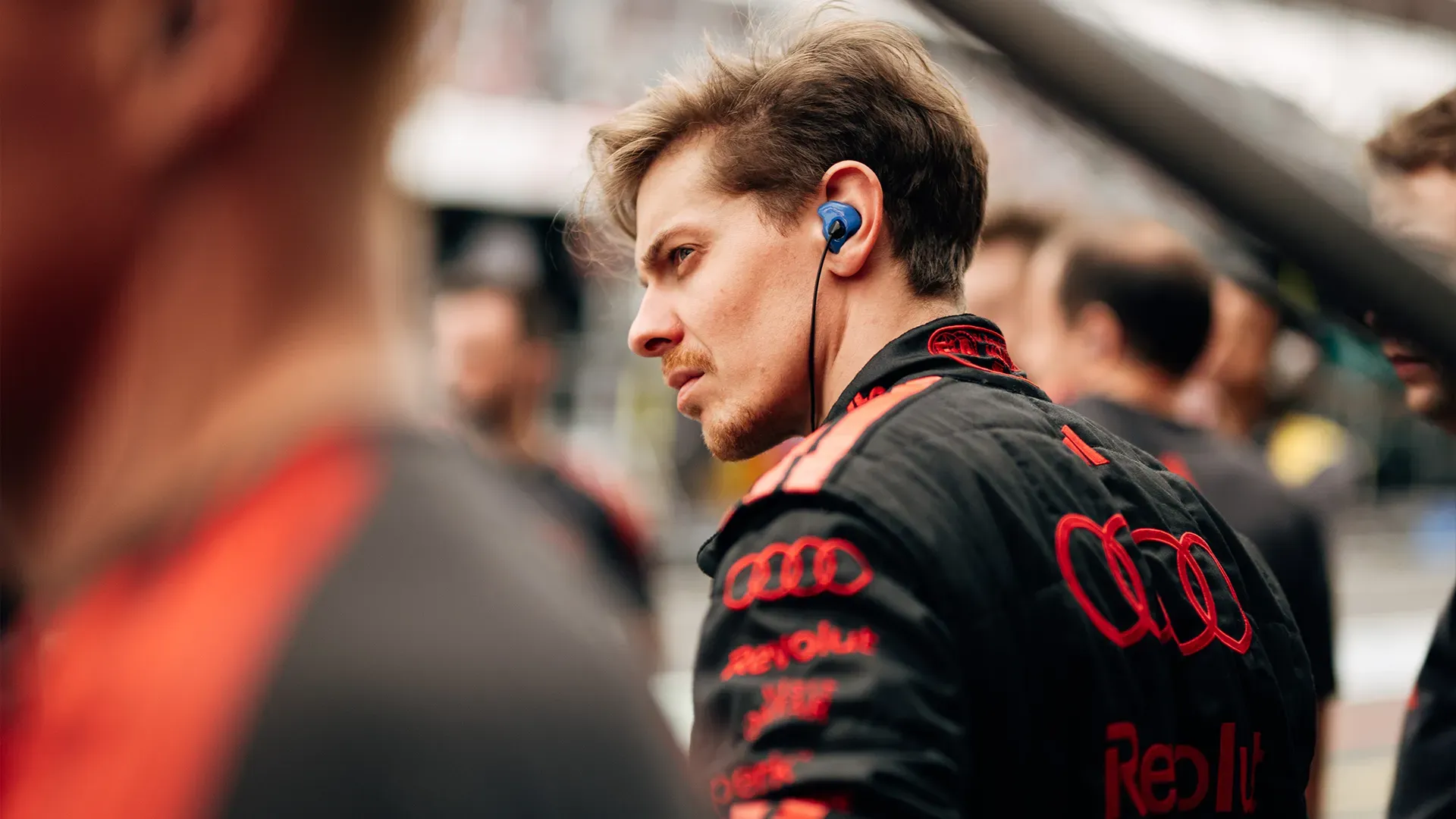 A team member smiling during the qualifying session