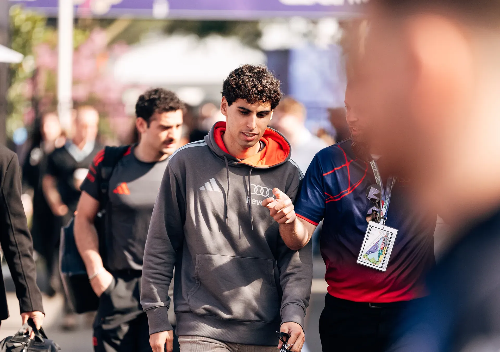 Gabi giving interviews during entering the Albert Park Circuit