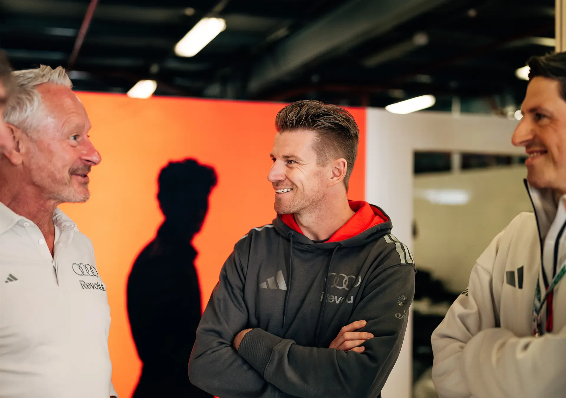 Nico talking and joking with Jonathan Wheatley