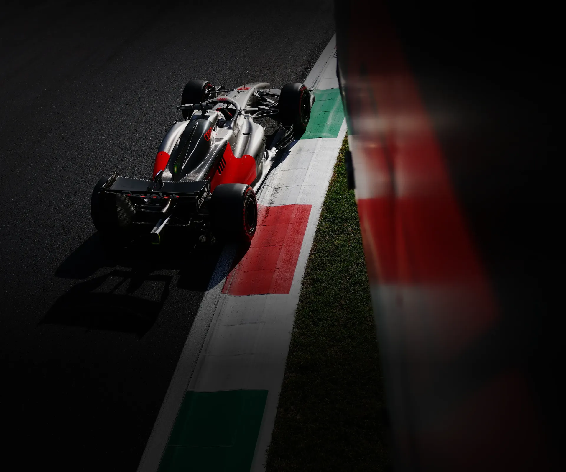 Top rear view of th Audi Revolut F1® Team car Audi R26 on the racetrack at high speed at the Italian GP 2026