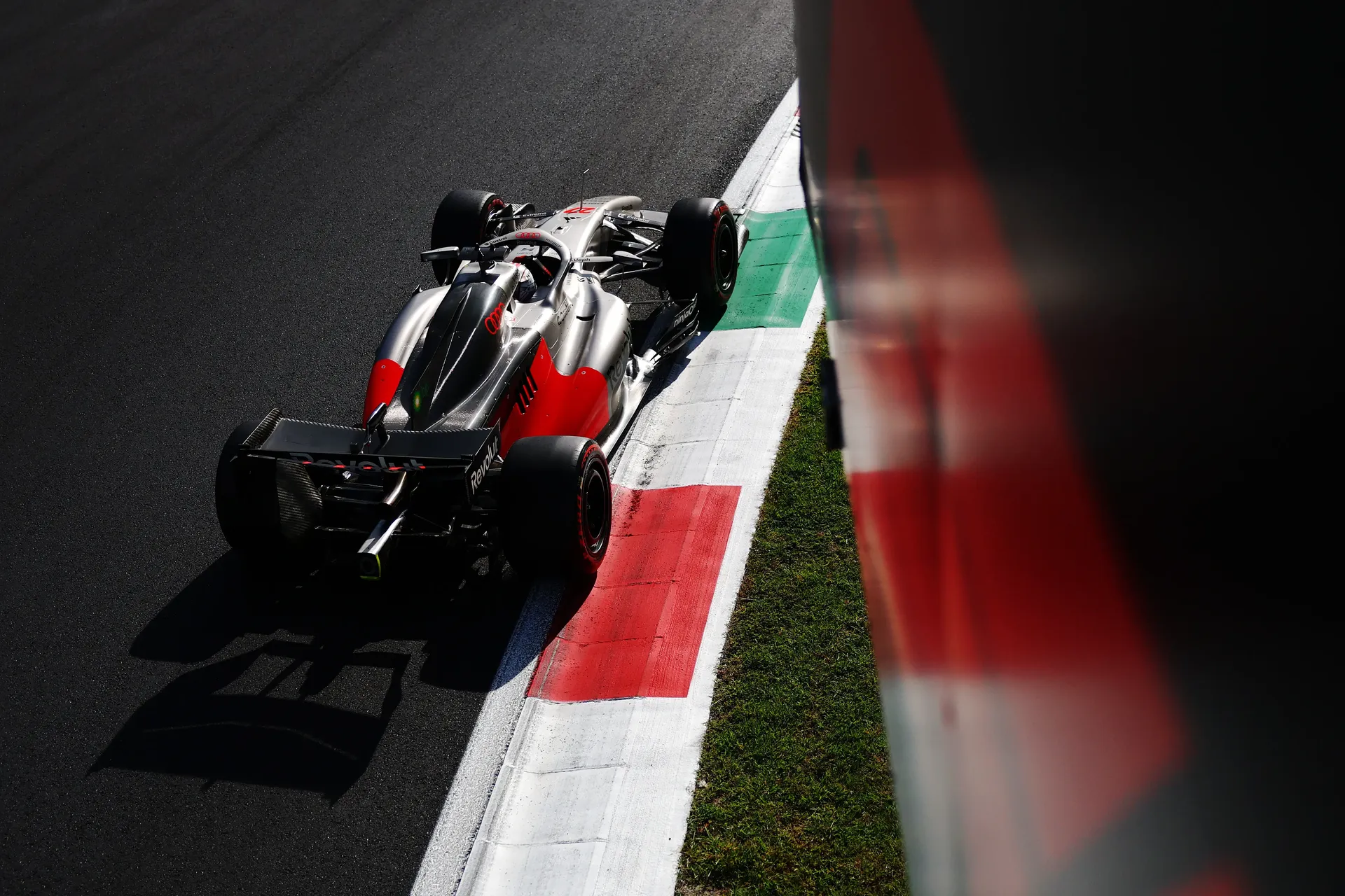 Top rear view of th Audi Revolut F1® Team car Audi R26 on the racetrack at high speed at the Italian GP 2026