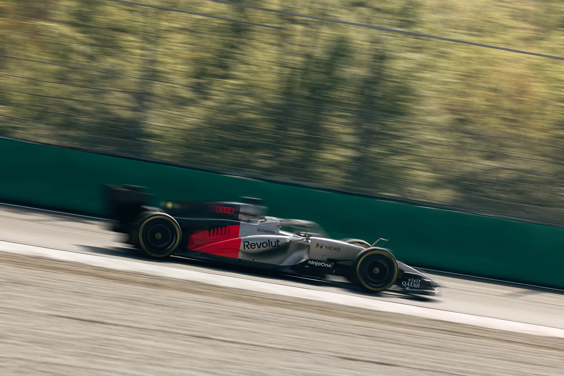 Audi R26 Formula 1® car driving at Monza circuit