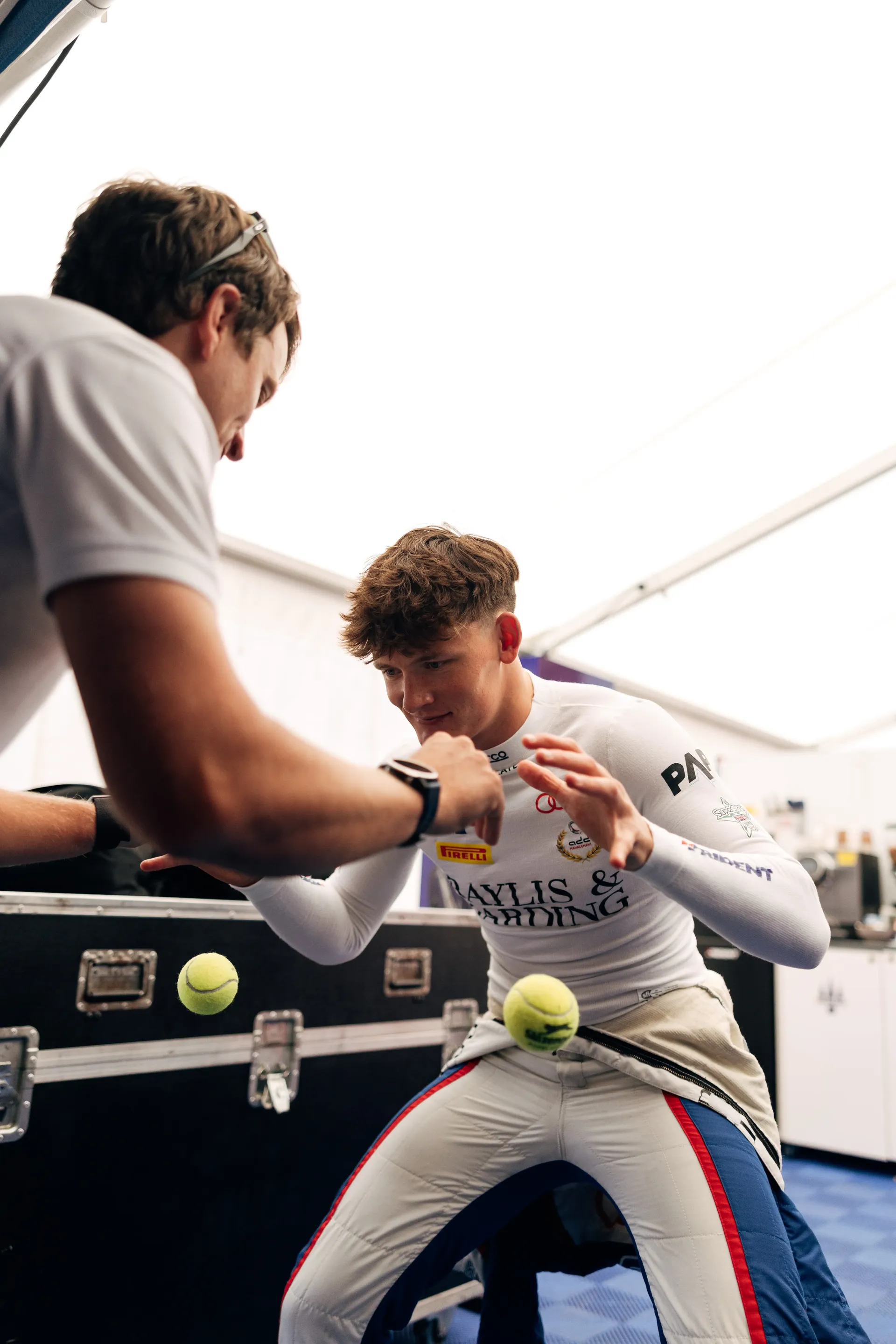 Audi Revolut F1® Team Academy driver Freddie Slater receives assistance while preparing for an FIA Formula 3 session at the Hungaroring.