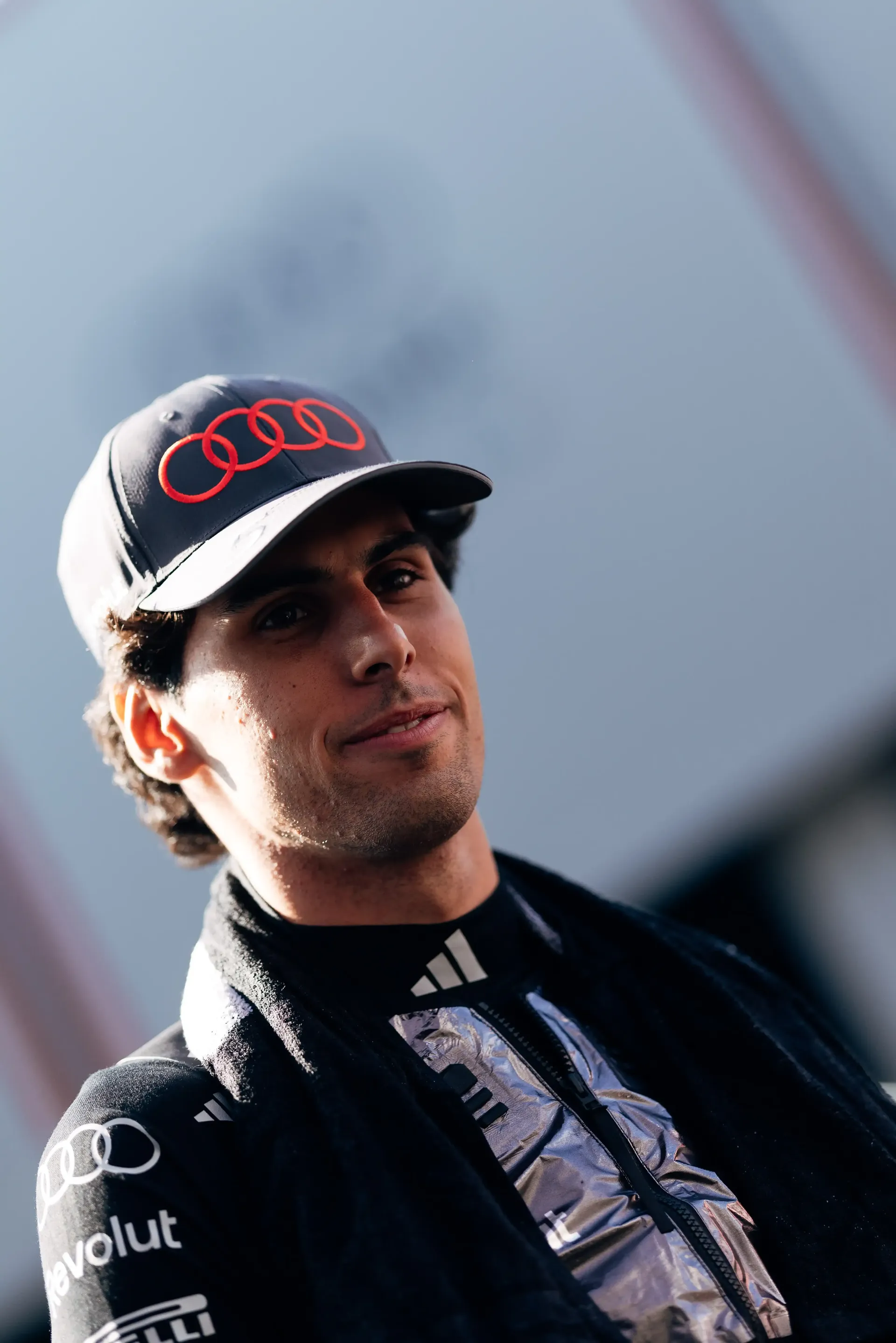 Close Up of Gabriel Bortoleto driver at the Audi Revolut F1® Team walking on the paddock at the Austrian Grand Prix 2026