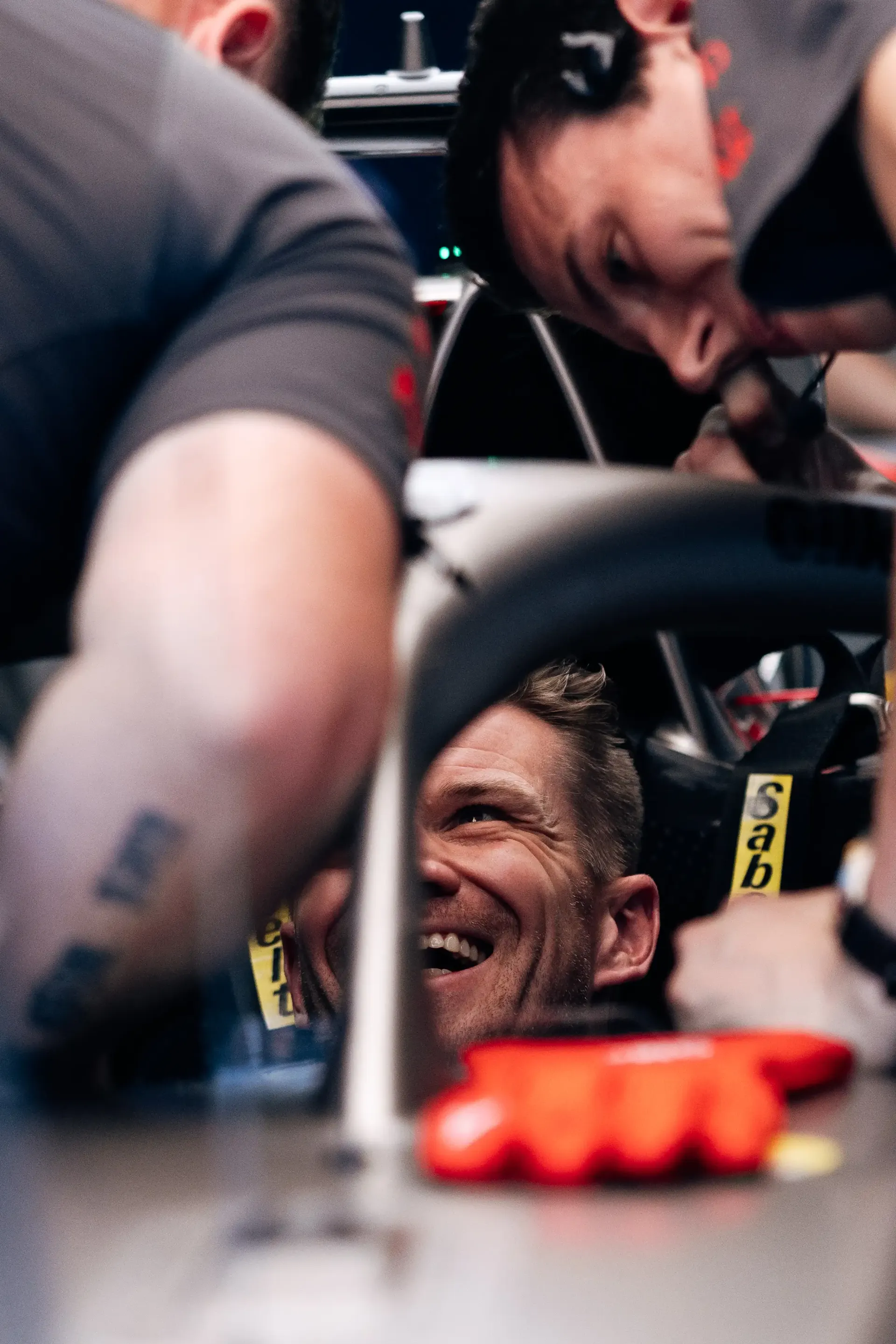 Cockpit close up of the Audi Revolut F1® Team car Audi R26 surrounded by team mechanics talking to team driver Nico Hulkenberg 