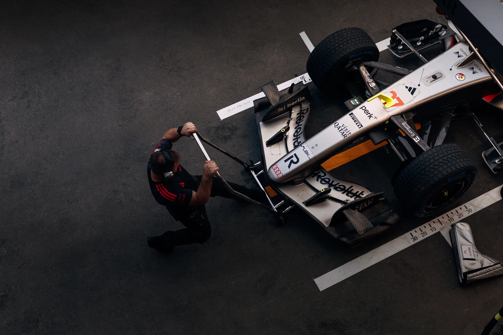Top Shot of the Audi Revolut F1® Team car R26 in the pit stop box