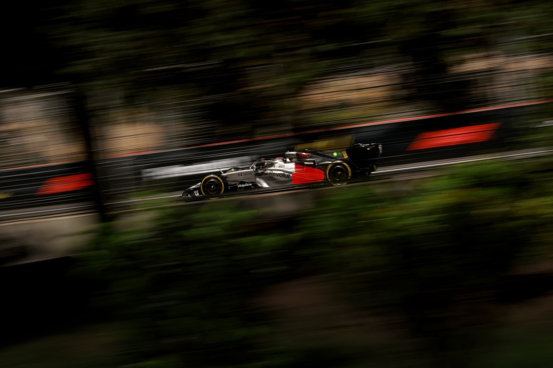 Side view of the Audi Revolut F1® Team car Audi R26 on the racetrack at the Azerbaijan Grand Prix 2026 at high speed