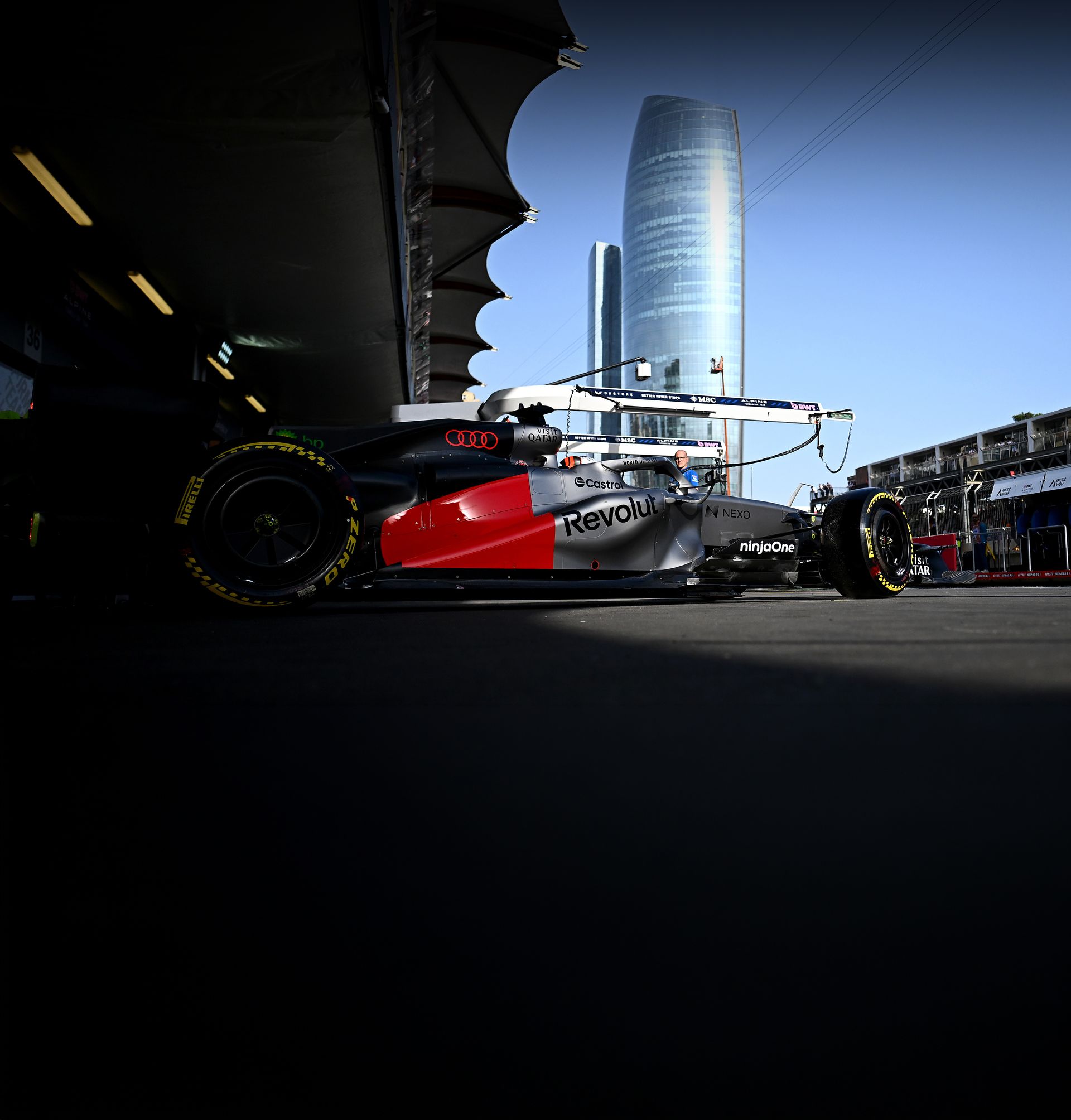 Side view of the Audi Revolut F1® Team car Audi R26 leaving the garage on the racetrack at the Azerbaijan Grand Prix 2026
