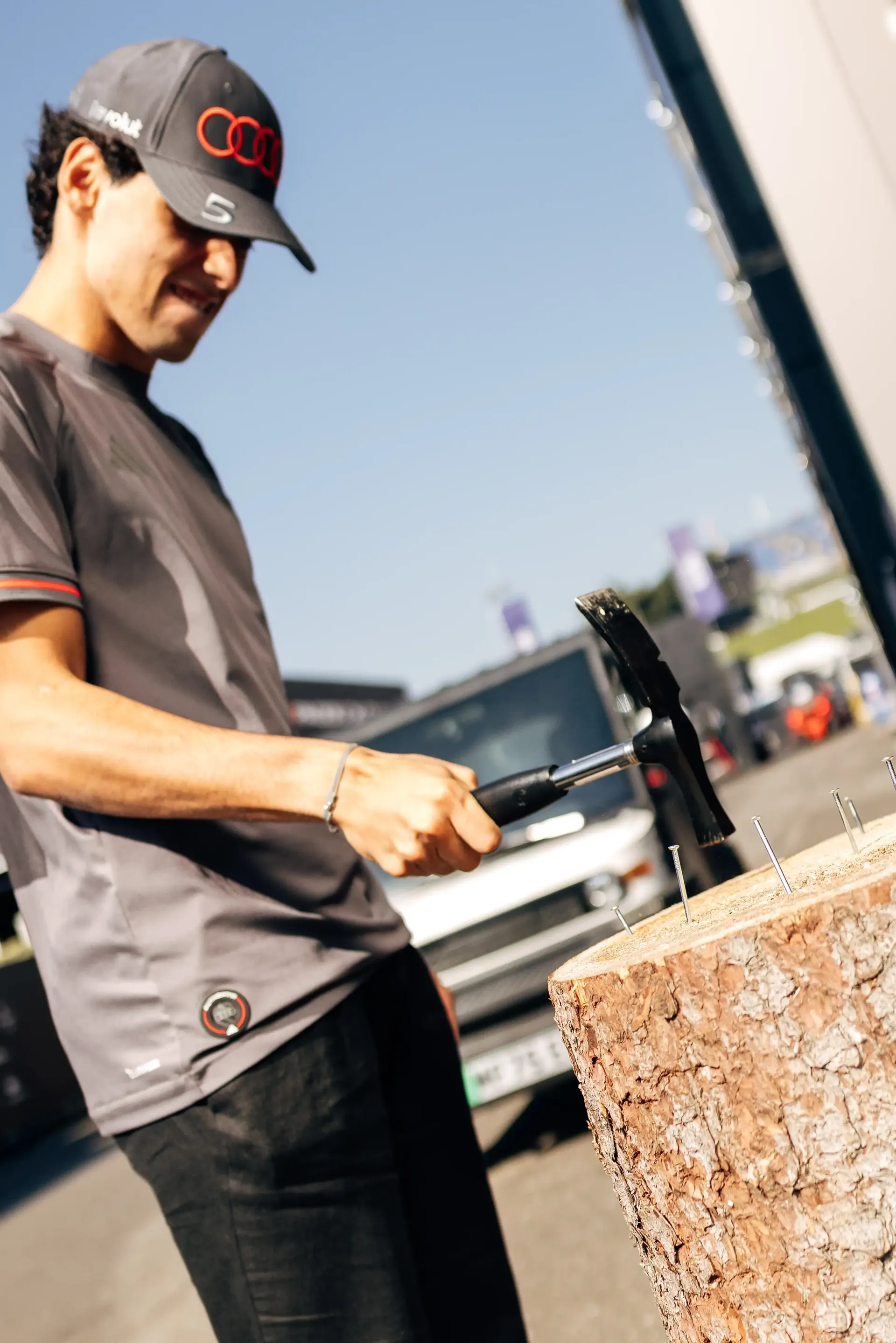 Gabriel Bortoleto prepares equipment in the Spielberg paddock ahead of FP3 at the Formula 1® Austrian Grand Prix at the Red Bull Ring, representing Audi Revolut F1® Team.
