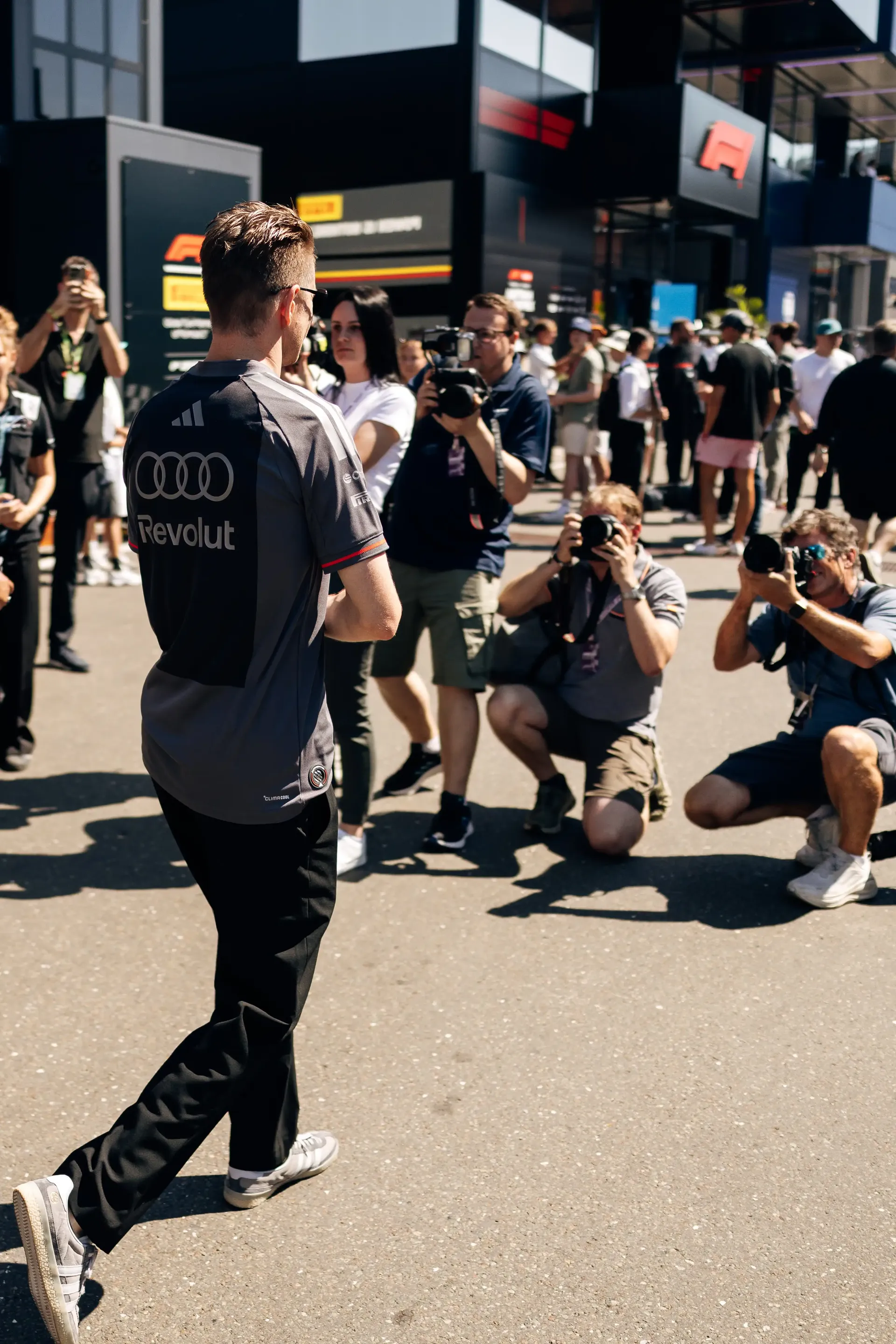 Nico Hulkenberg greets fans and reporters during the fan forum ahead of FP3 at the Formula 1® Austrian Grand Prix at the Red Bull Ring, representing Audi Revolut F1® Team.