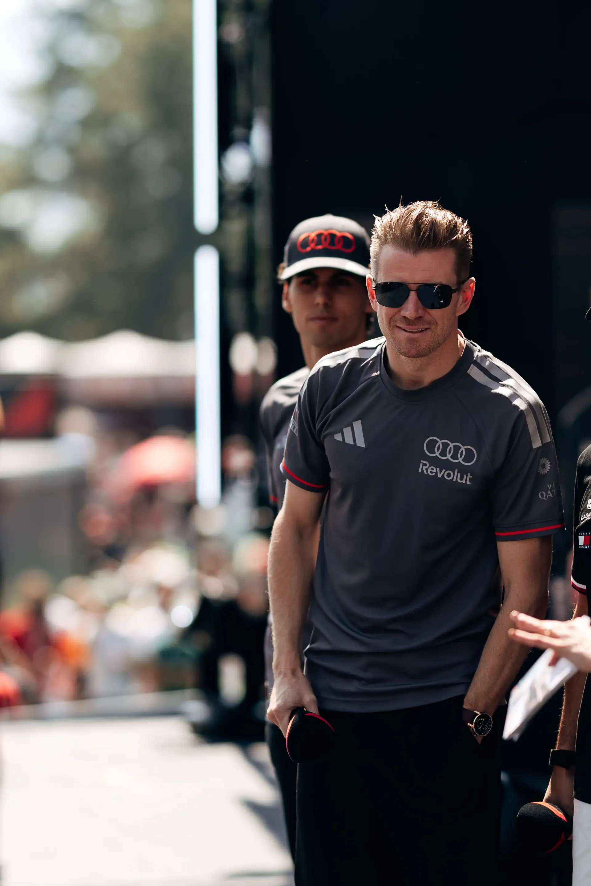Nico Hulkenberg walks backstage during the fan forum ahead of FP3 at the Formula 1® Austrian Grand Prix at the Red Bull Ring, representing Audi Revolut F1® Team.