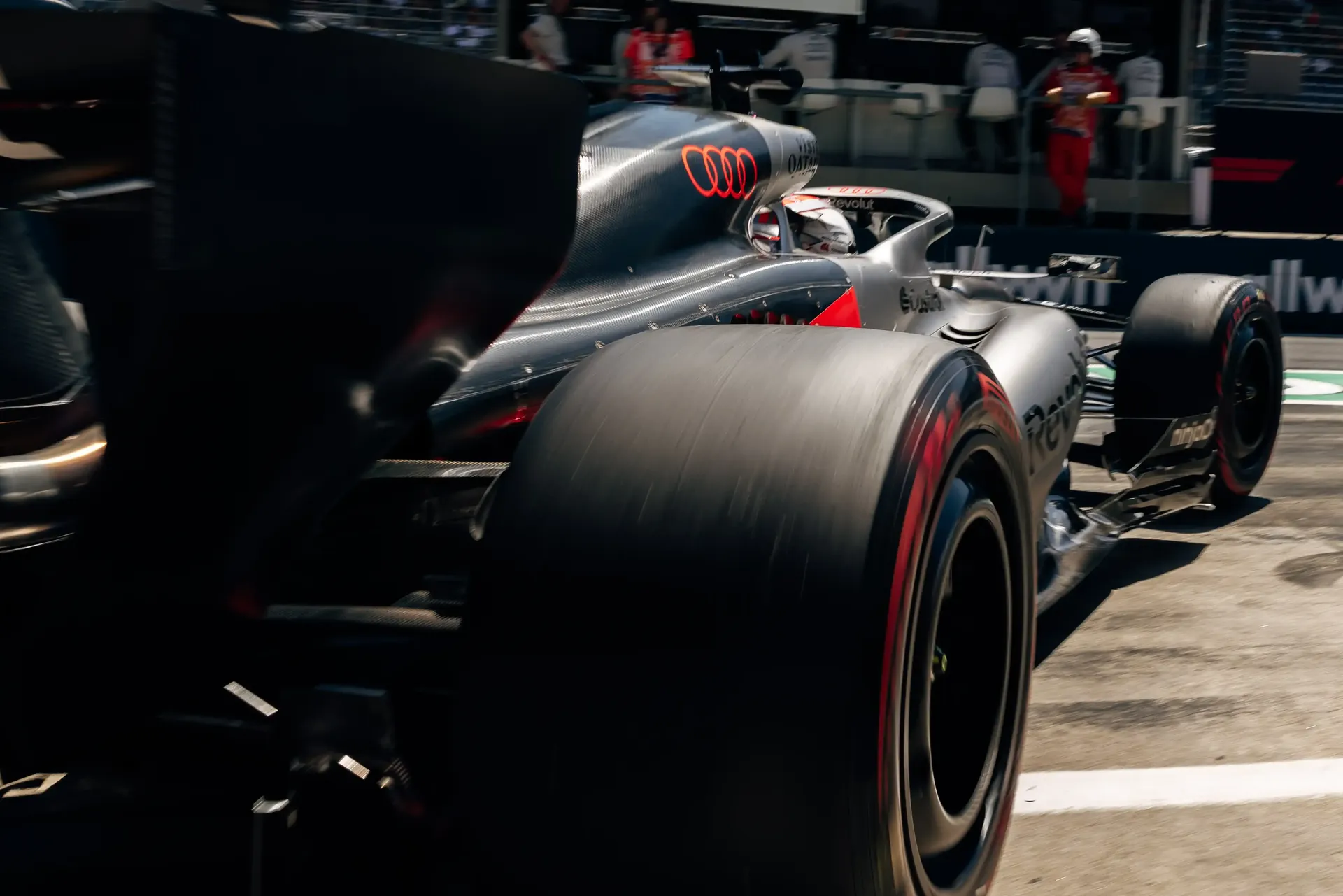 Rear three-quarter view of the Audi R26 in the pit lane during FP3 at the Austrian Grand Prix in Spielberg.