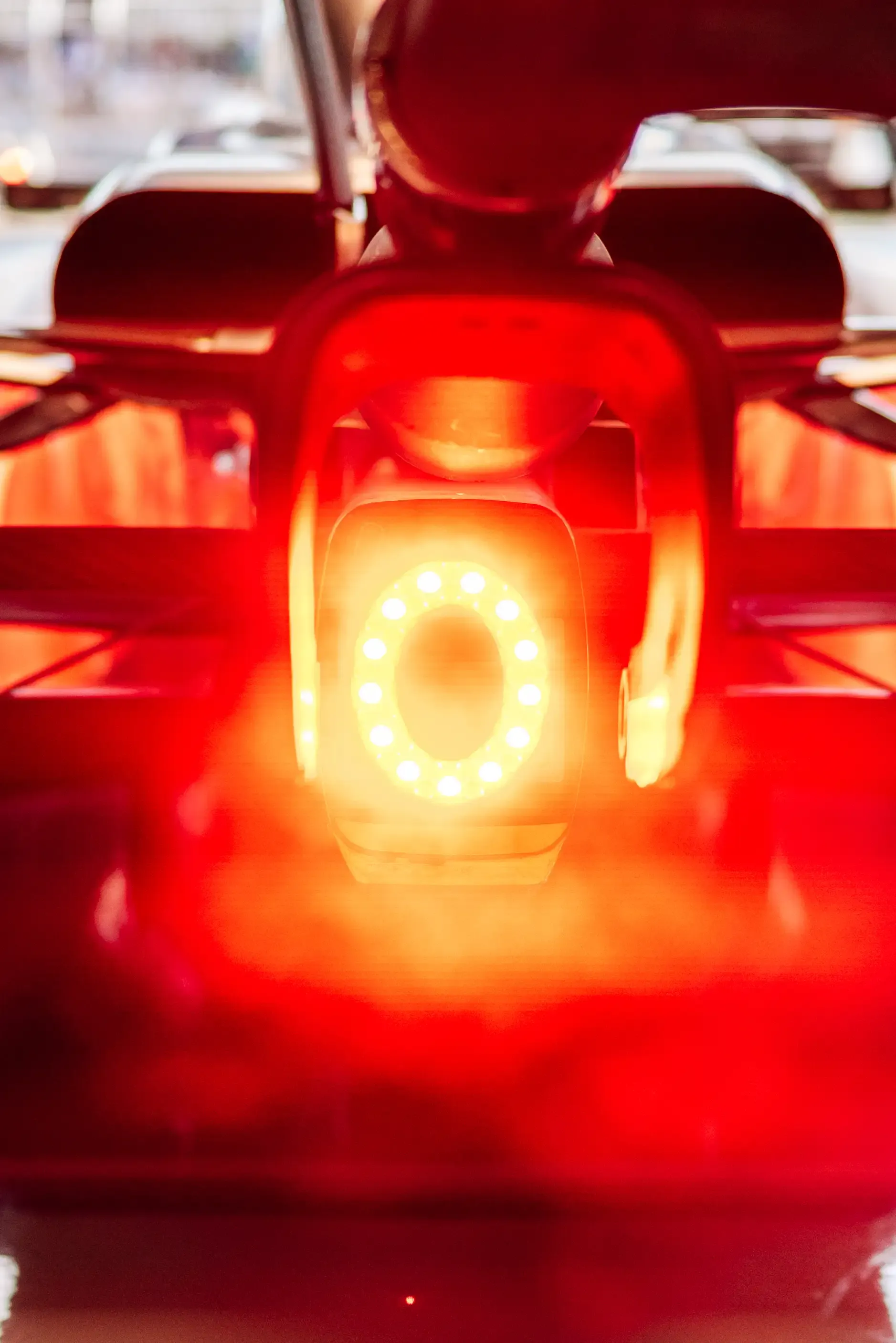 Rear rain light illuminated on the Audi R26 in the Audi Revolut F1® Team garage during Qualifying at the Austrian Grand Prix in Spielberg.