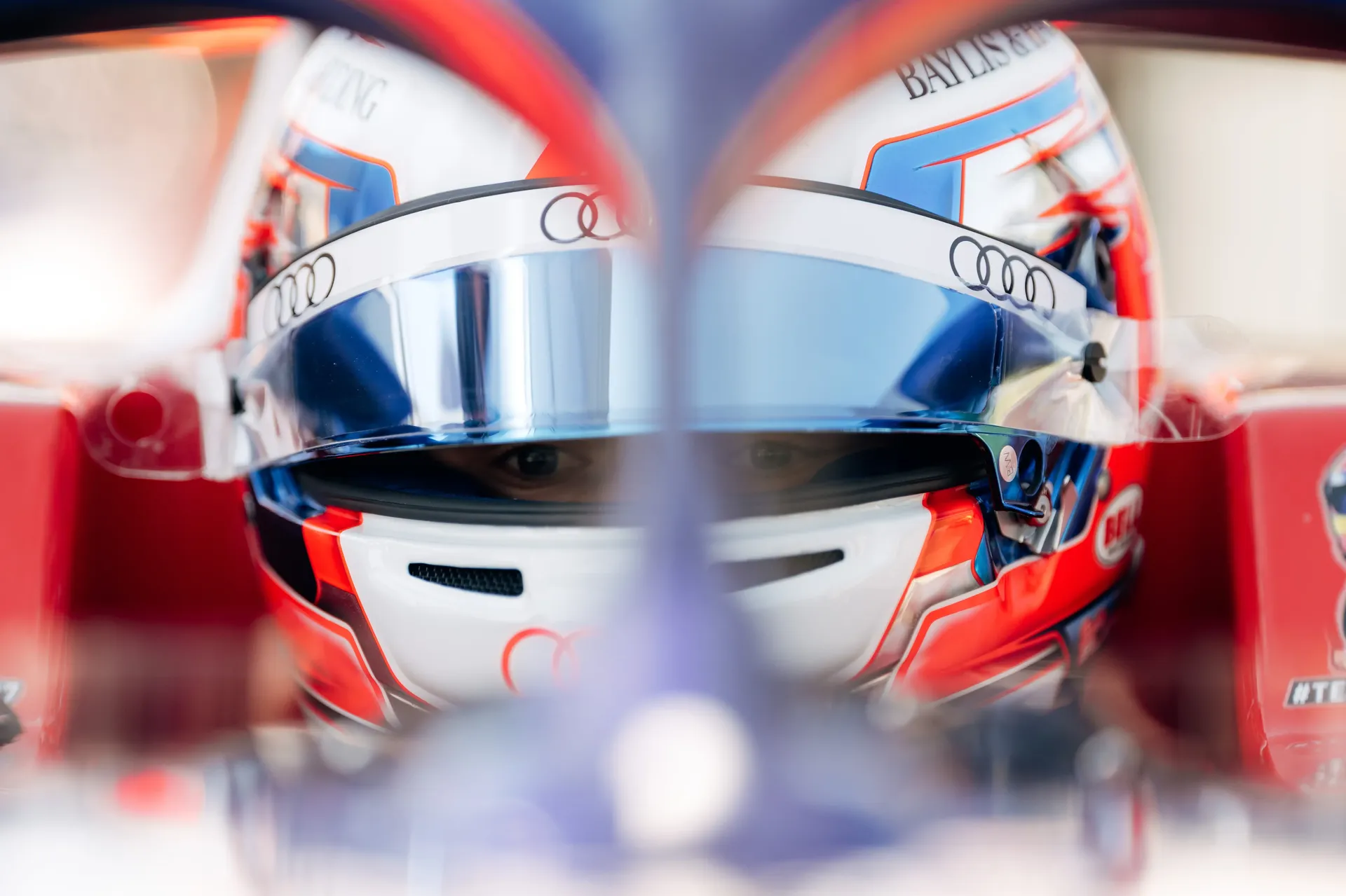 Close-up portrait of Freddie Slater wearing his racing helmet before the FIA Formula 3 race at Spielberg.