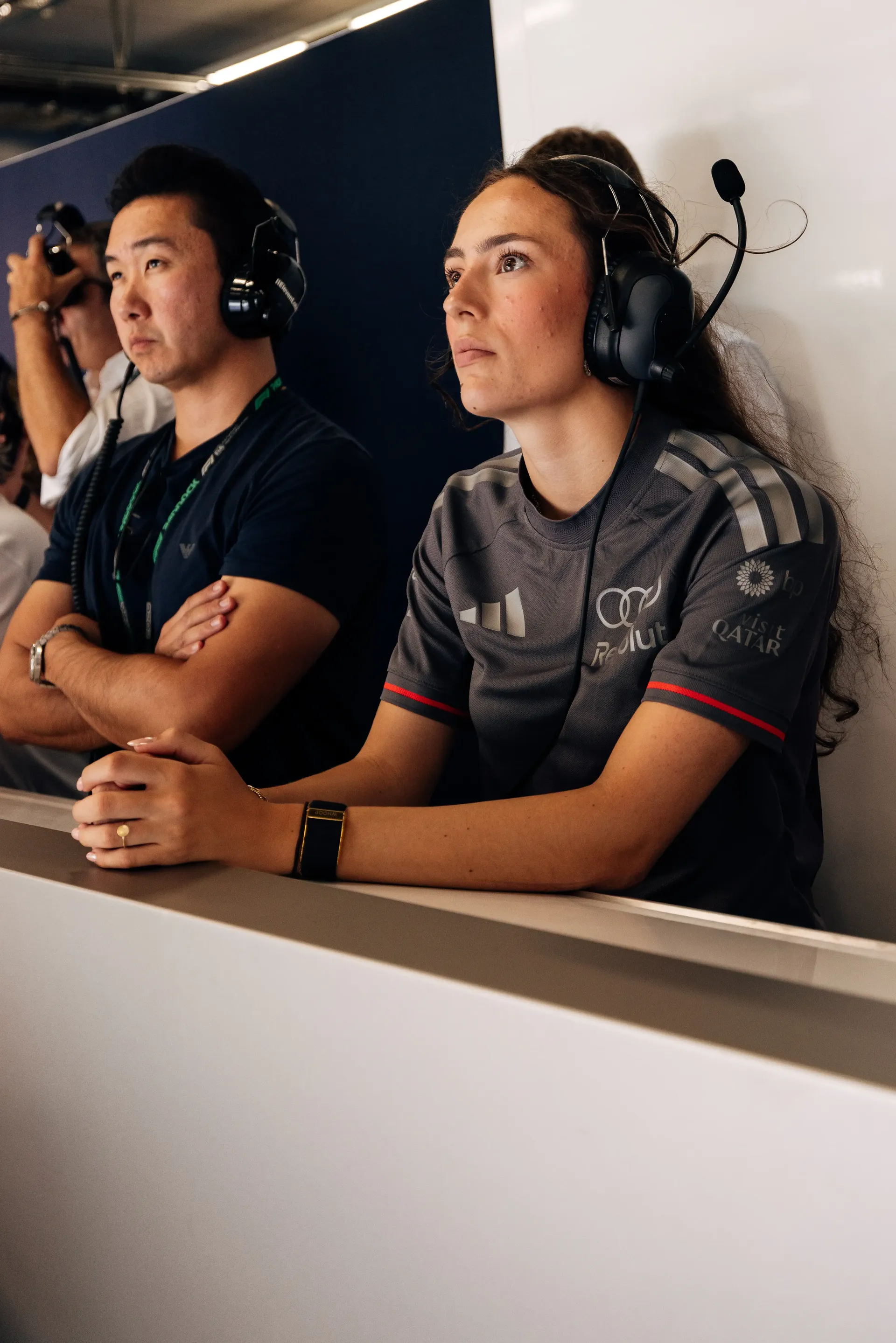 Emma Felbermayr, Audi Driver Development Programme and Academy F1® driver, watches the race from the Audi Revolut F1® Team garage at Spielberg.