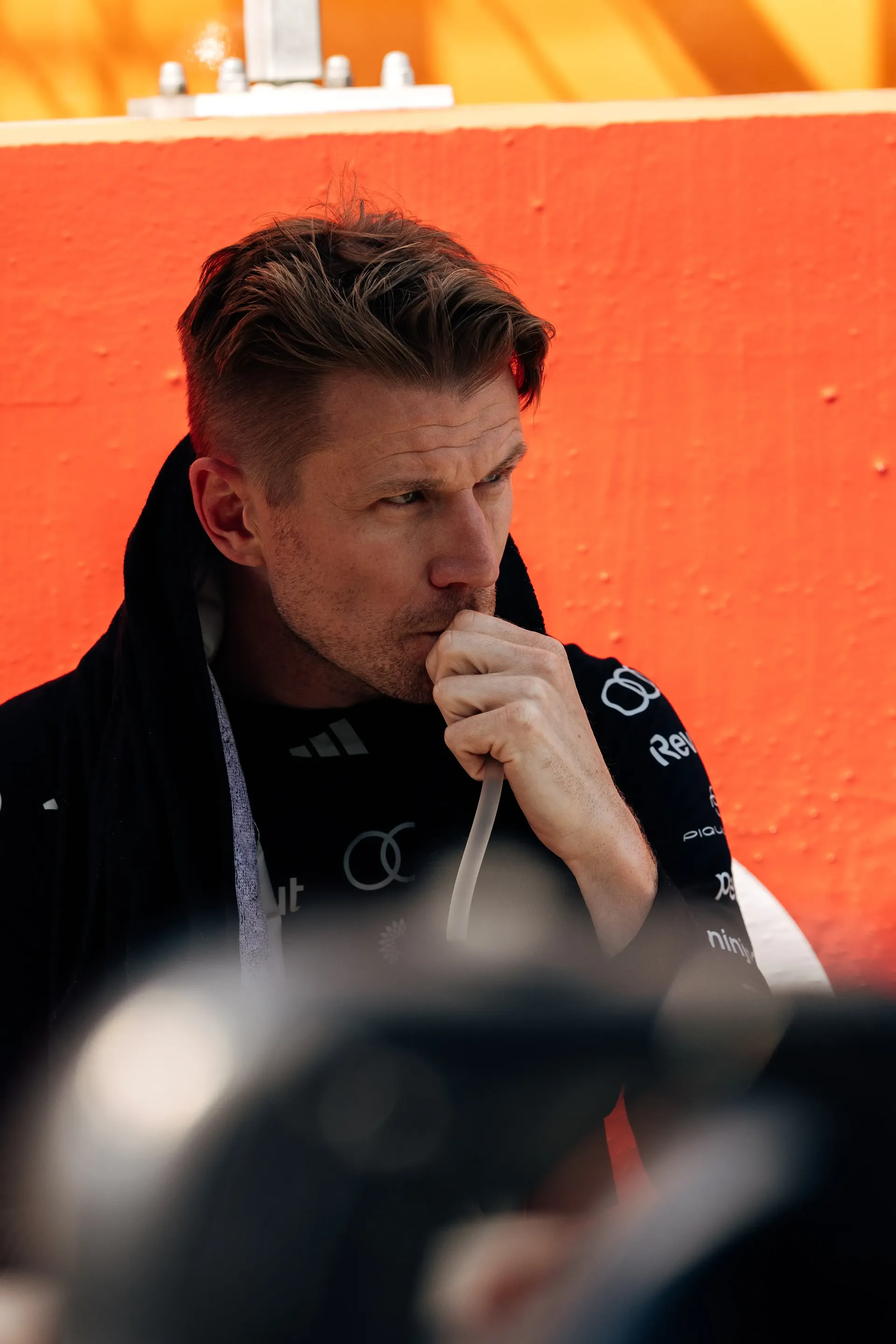 Nico Hulkenberg driver at the Audi Revolut F1® Team focuses on race operations from the pit wall.