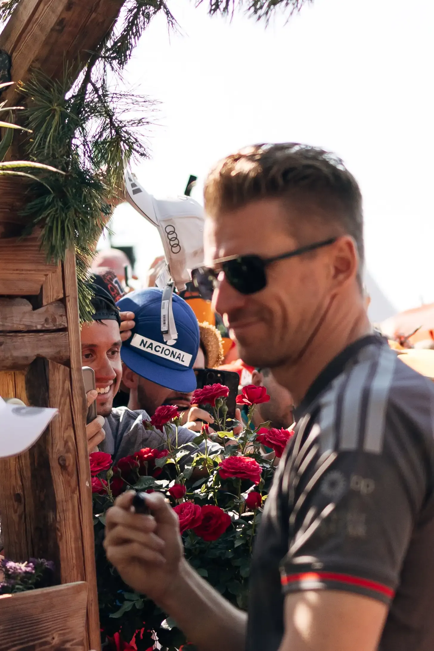Nico Hulkenberg receives flowers during the traditional Austrian welcome before the Formula 1® Austrian Grand Prix in Spielberg before the race.