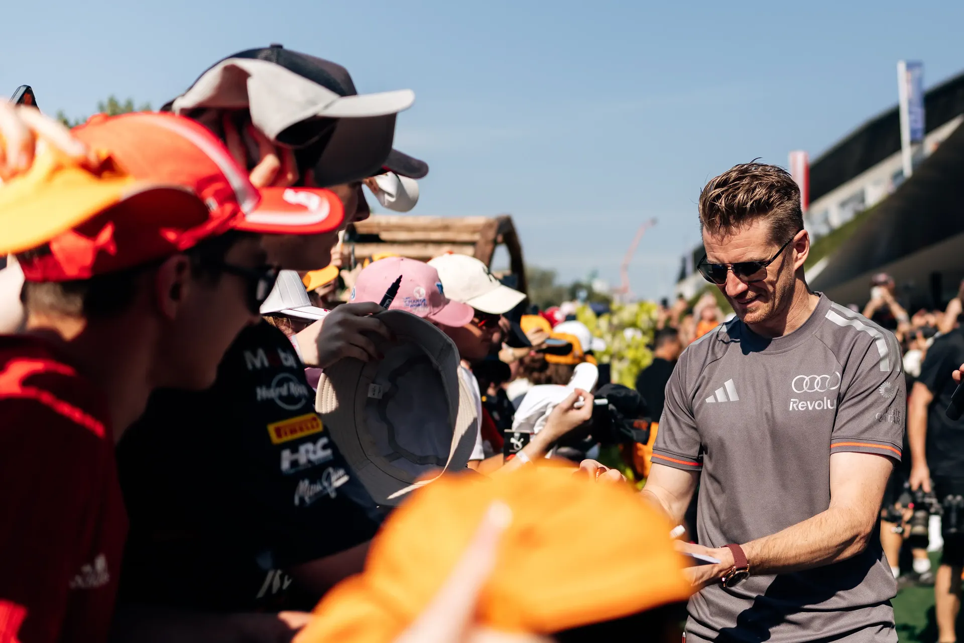 Nico Hulkenberg signs autographs for fans before the Formula 1® Austrian Grand Prix in Spielberg before the race.
