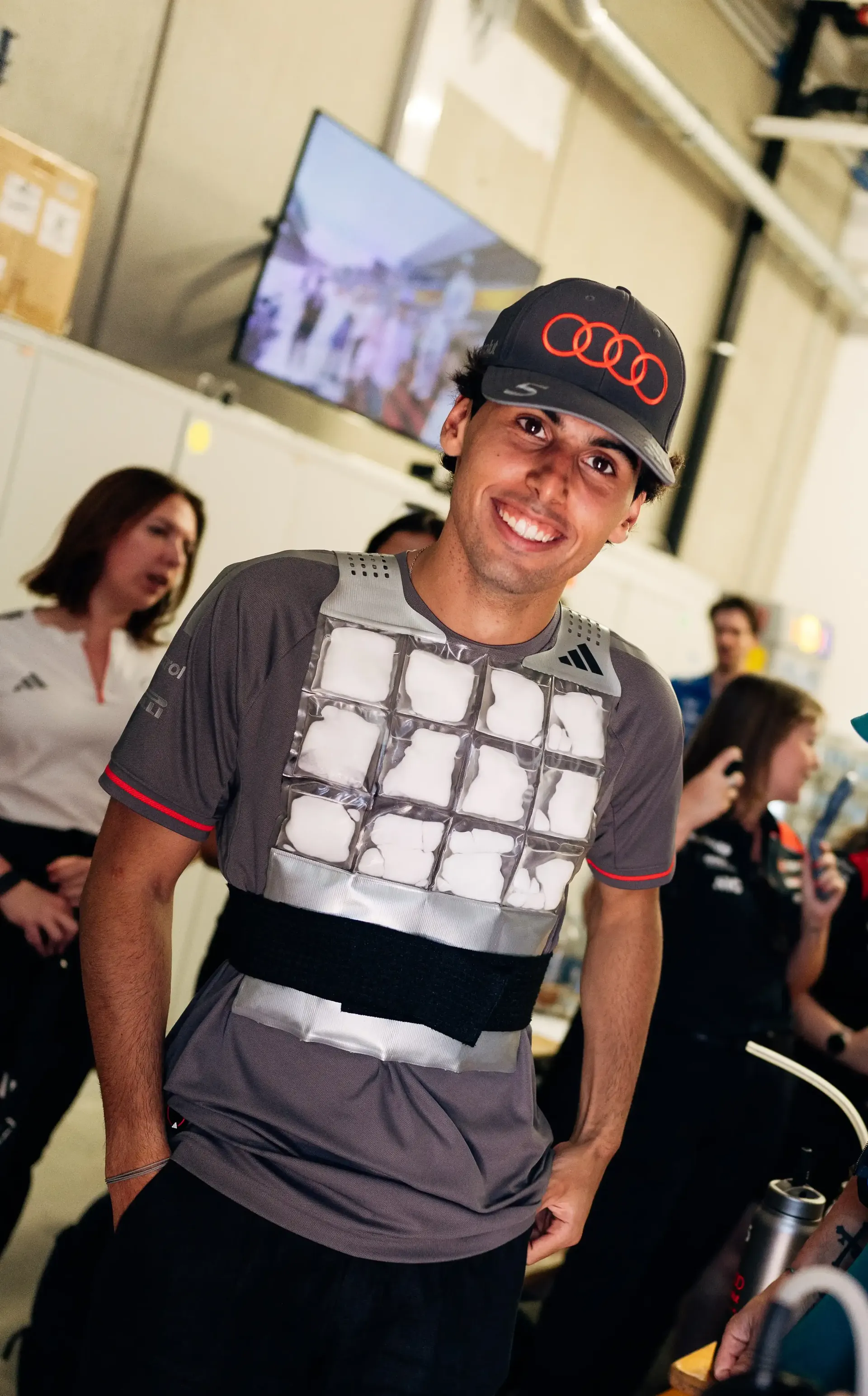 Gabriel Bortoleto smiles while meeting fans ahead of the Formula 1 Drivers' Parade before the Austrian Grand Prix in Spielberg.