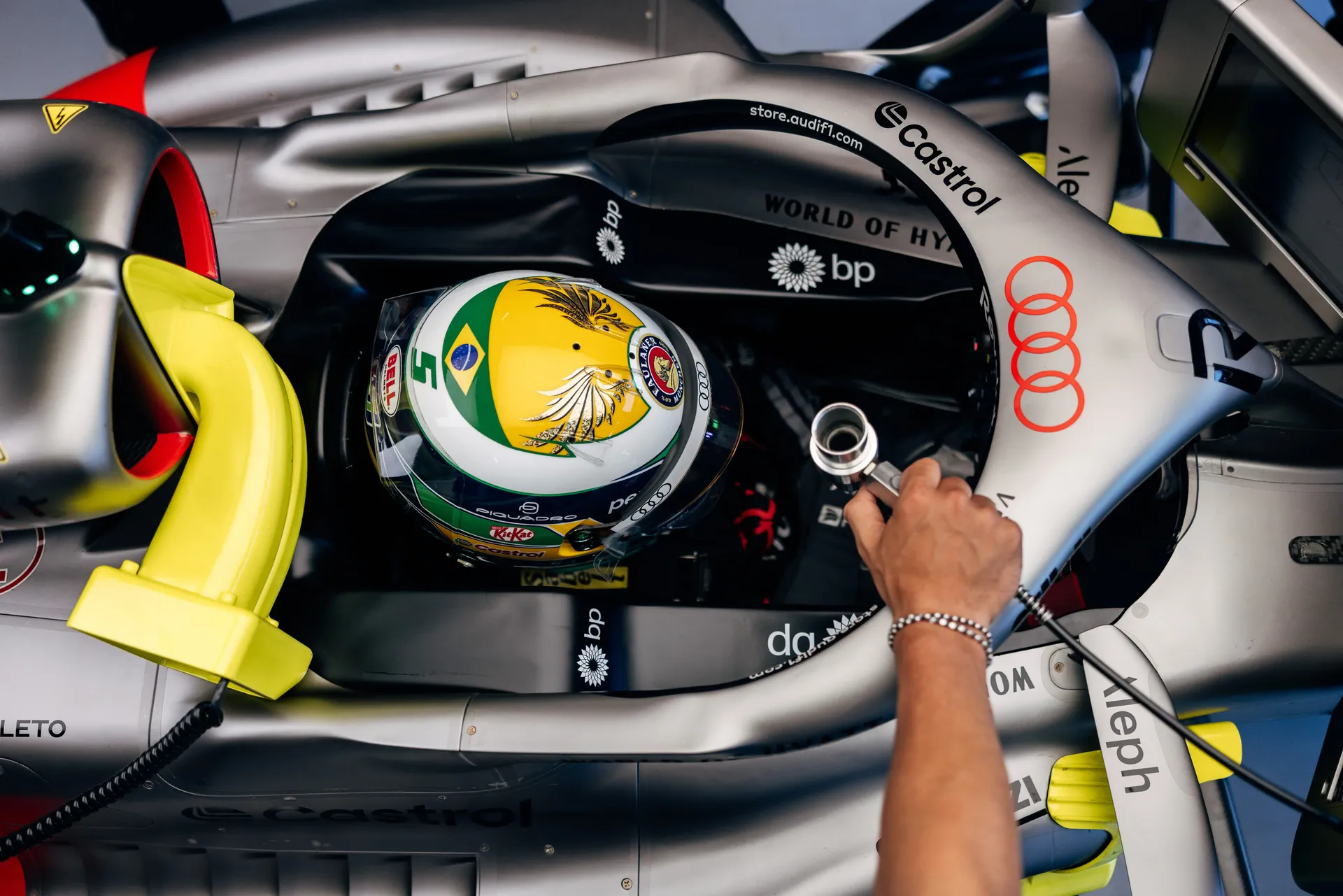 Overhead cockpit view of Gabriel Bortoleto driver at the Audi Revolut F1® Team seated in the cockpit of the Audi R26 during FP2 at the Red Bull Ring.