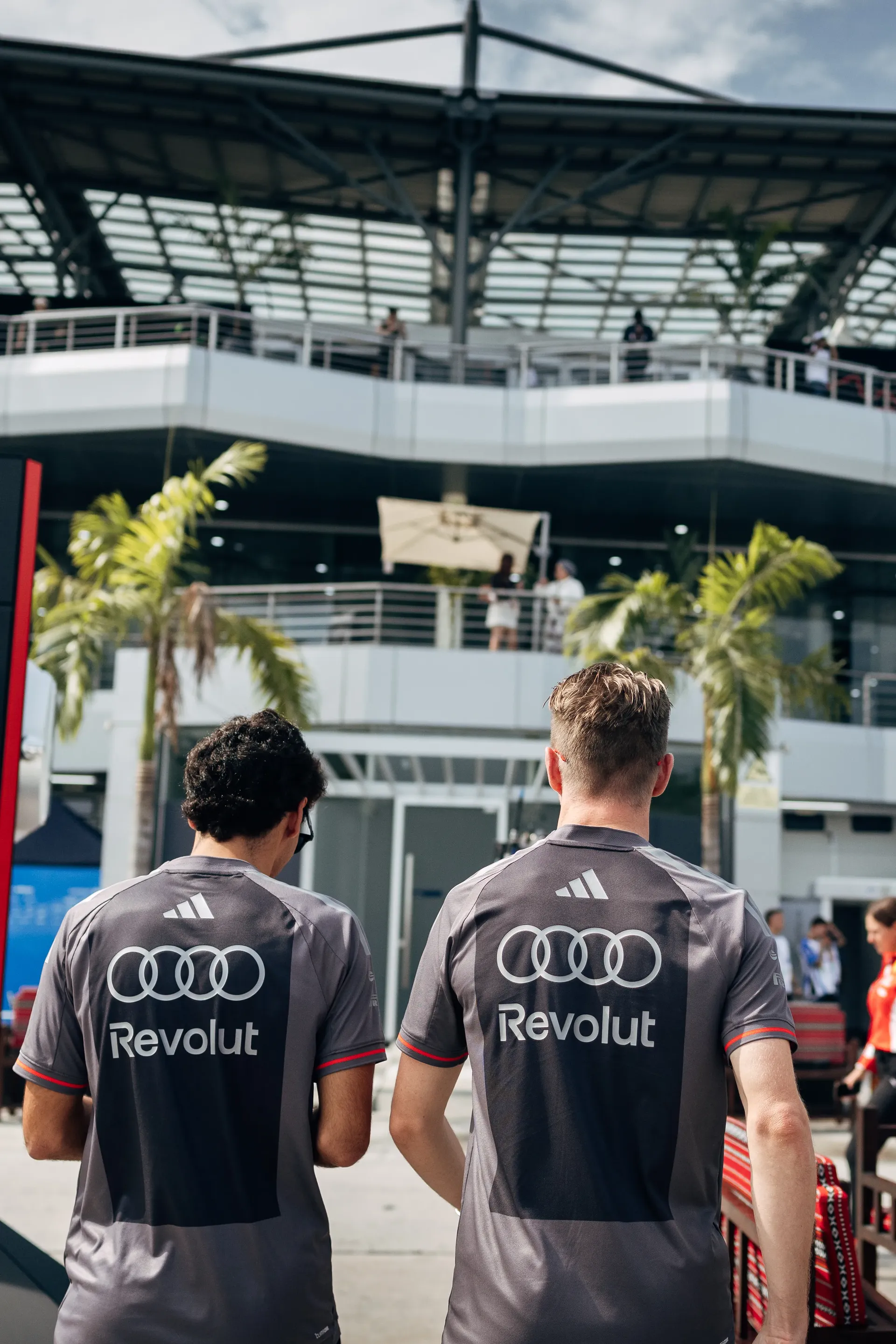 Audi Revolut F1® Team drivers Nico Hulkenberg and Gabriel Bortoleto arriving at the circuit