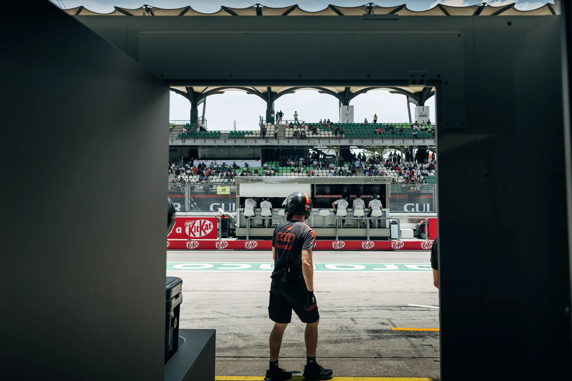 Audi Revolut F1® Team crew in the pit lane