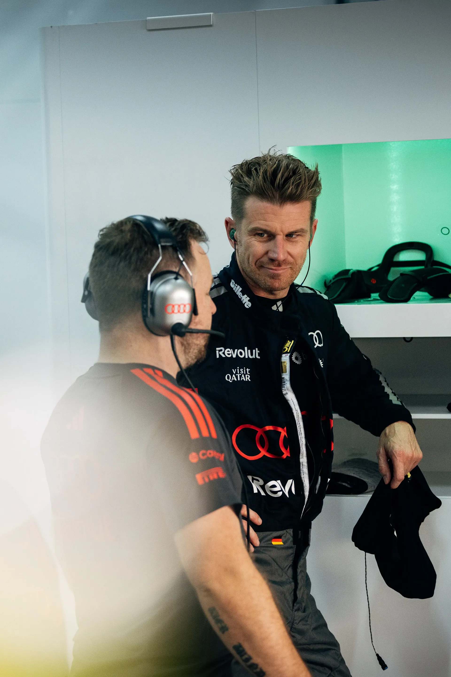 Nico Hulkenberg driver at Audi Revolut F1® Team with team member