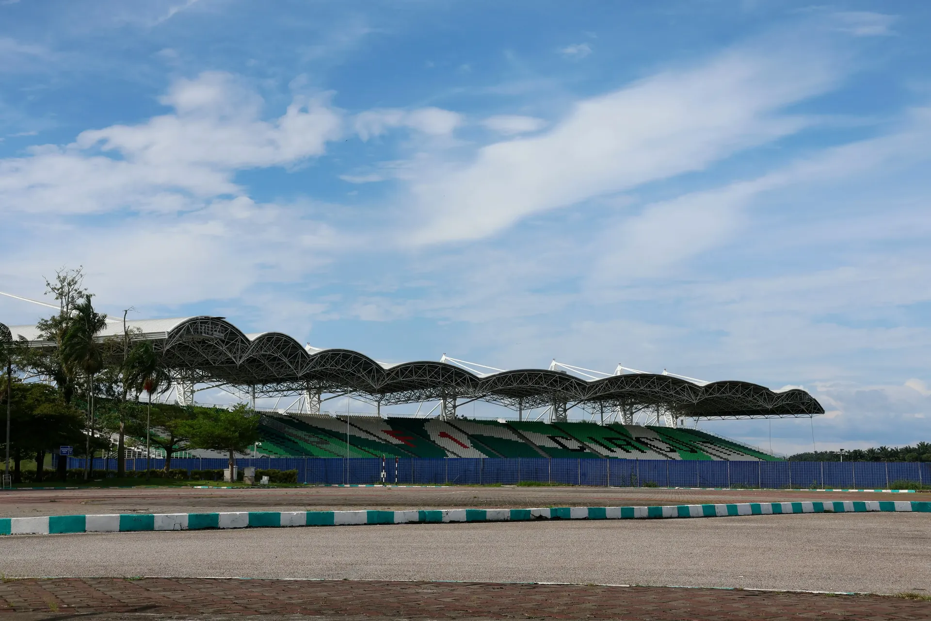 Wide view of the Sepang International Circuit grandstand and main straight ahead of the Formula 1® Bahrain Grand Prix 2026 in Malaysia.
