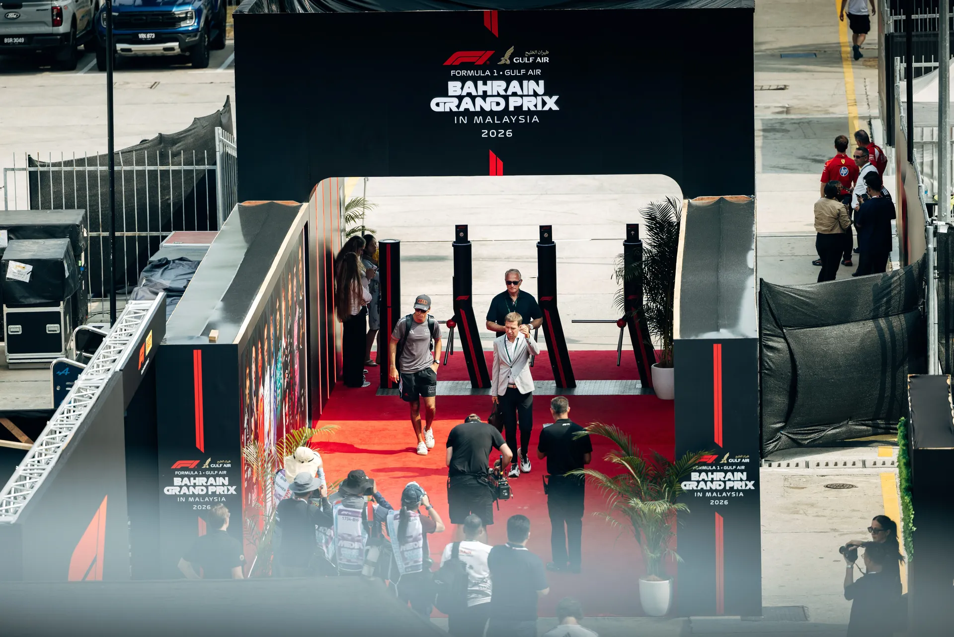 Gabriel Bortoleto driver at Audi Revolut F1® Team walking through the paddock