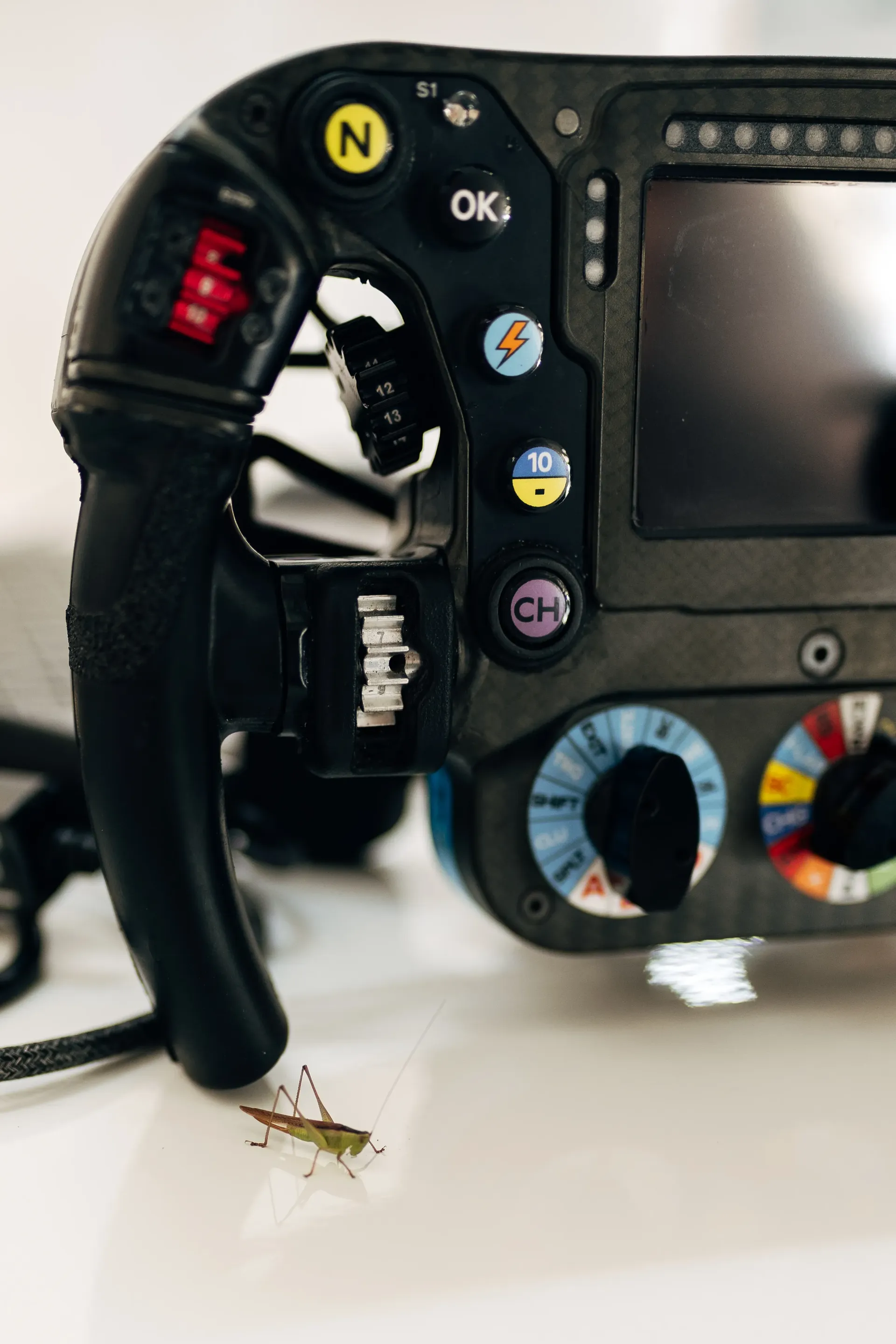 Audi R26 steering wheel in the garage