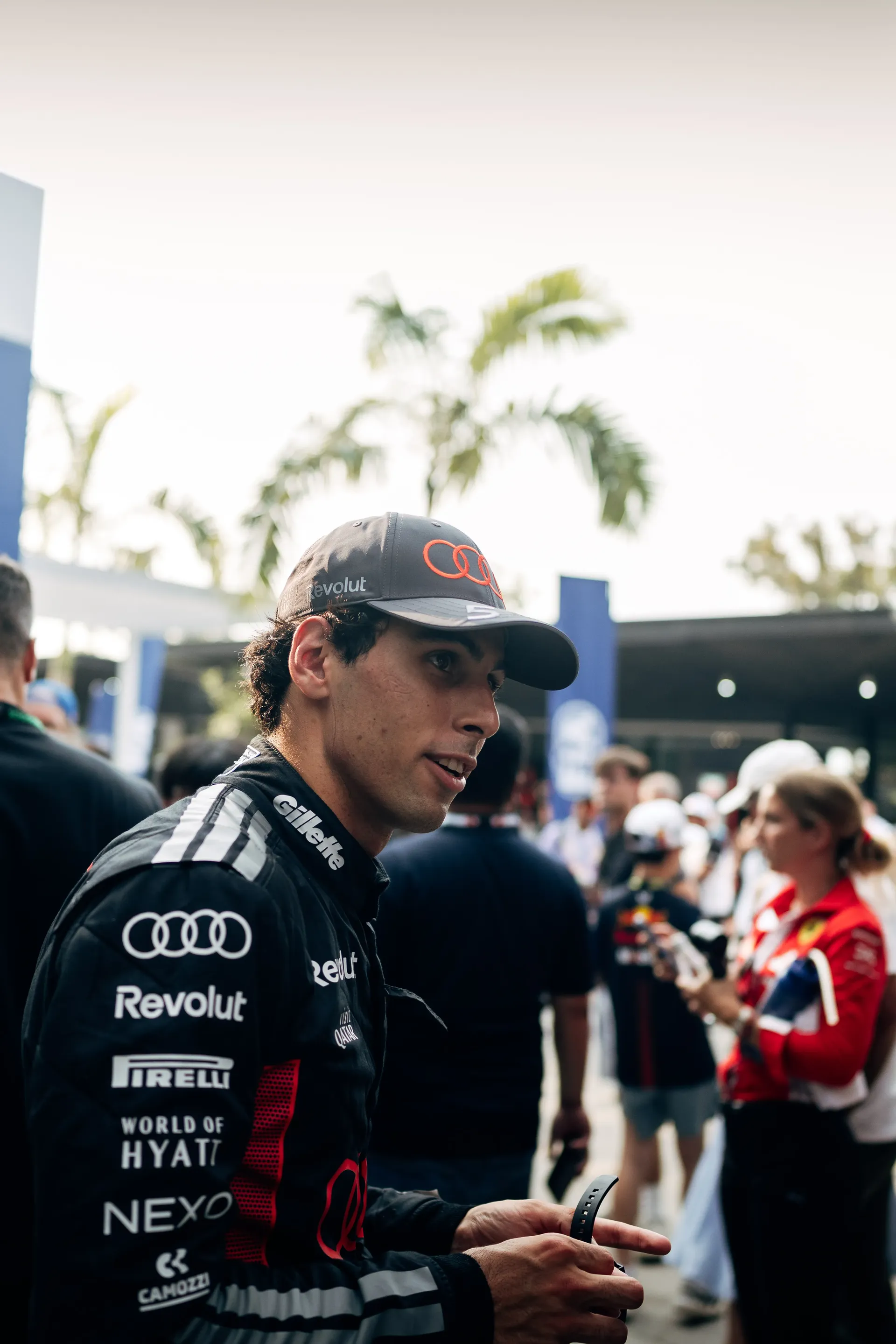 Audi Revolut F1® Team team driver Gabriel Bortoleto walks inside the paddock