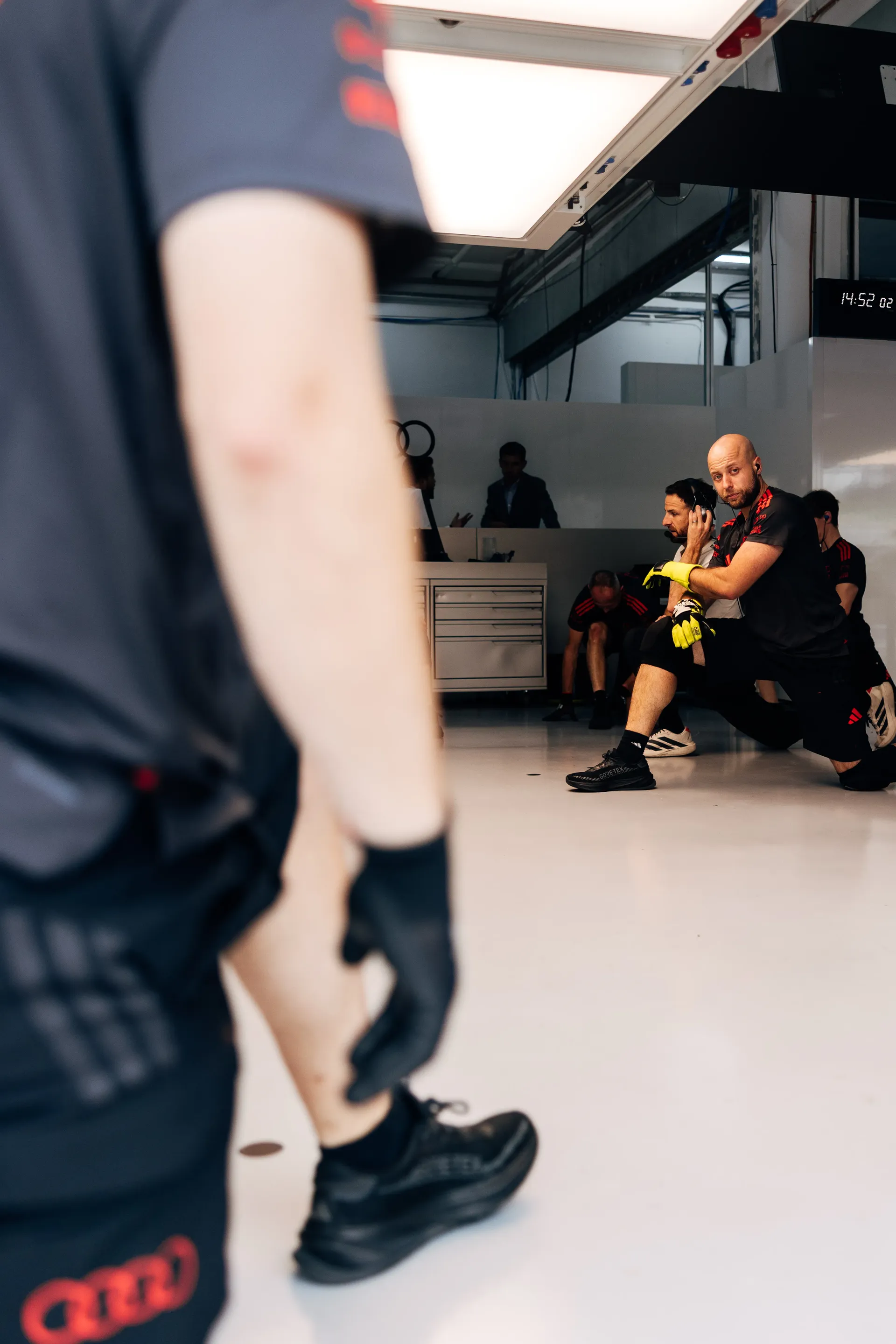 Audi Revolut F1® Team mechanic standing in the garage